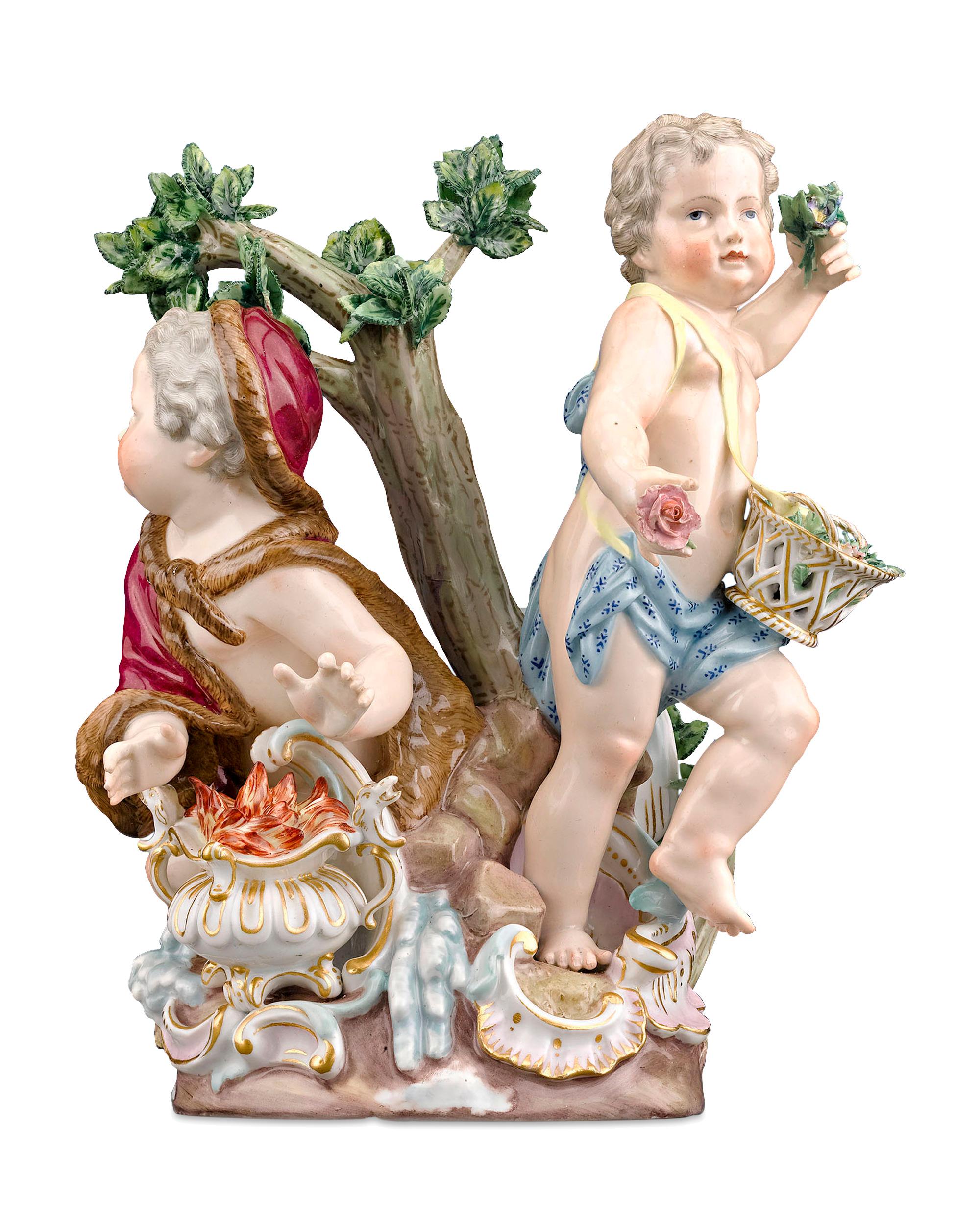 Entitled Winter and Spring this Meissen Porcelain figural group features a cloaked putto staying warm by a fire (Winter) and another gathering flowers (Spring). Part of the company's beloved Seasons series, the putti rest upon a rocaille-formed base