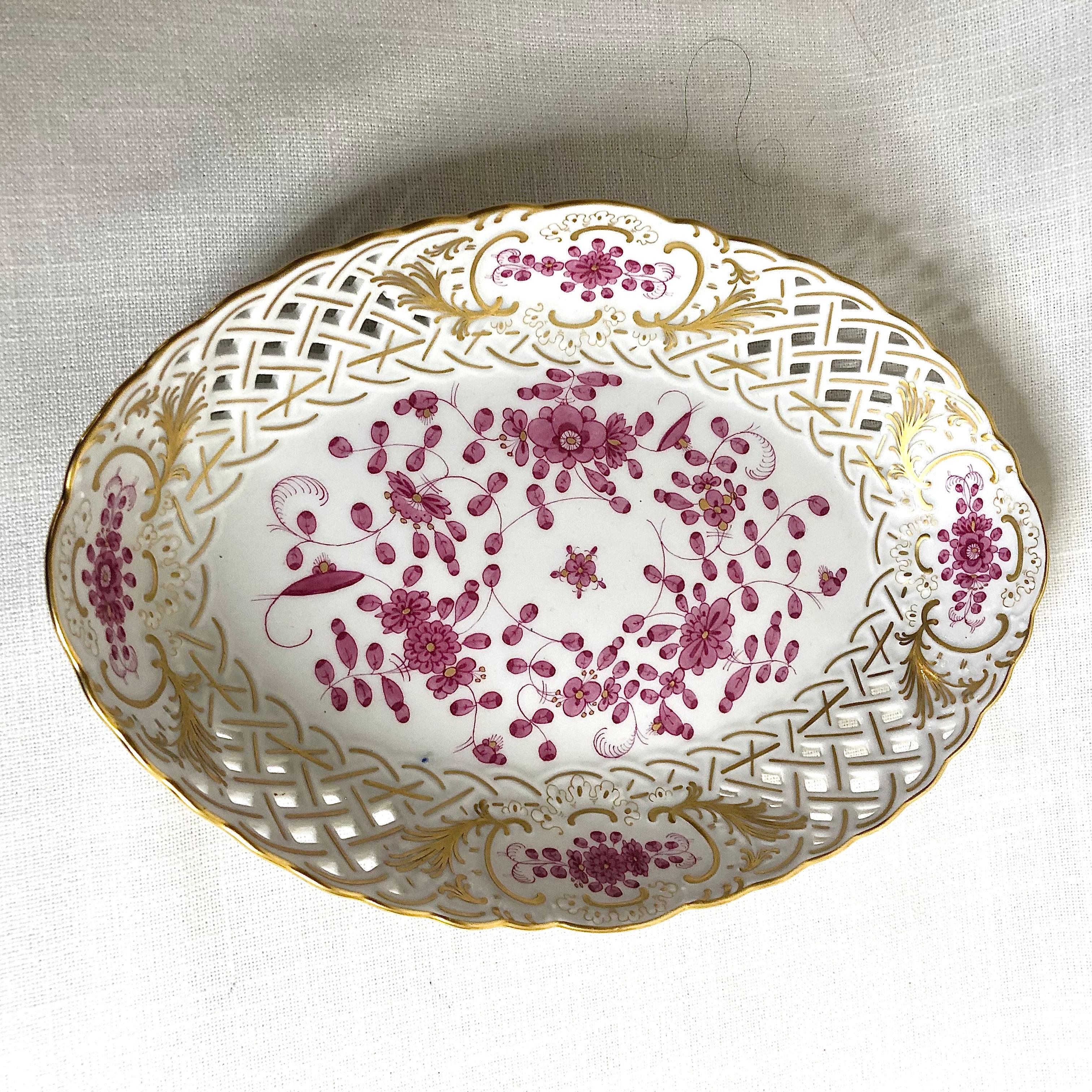 This is a beautiful Meissen purple Indian reticulated oval serving bowl. The purple Indian pattern of Meissen is one of my favorite patterns, as it has beautiful colors on a white porcelain ground. It is so cheerful and very eye catching. This