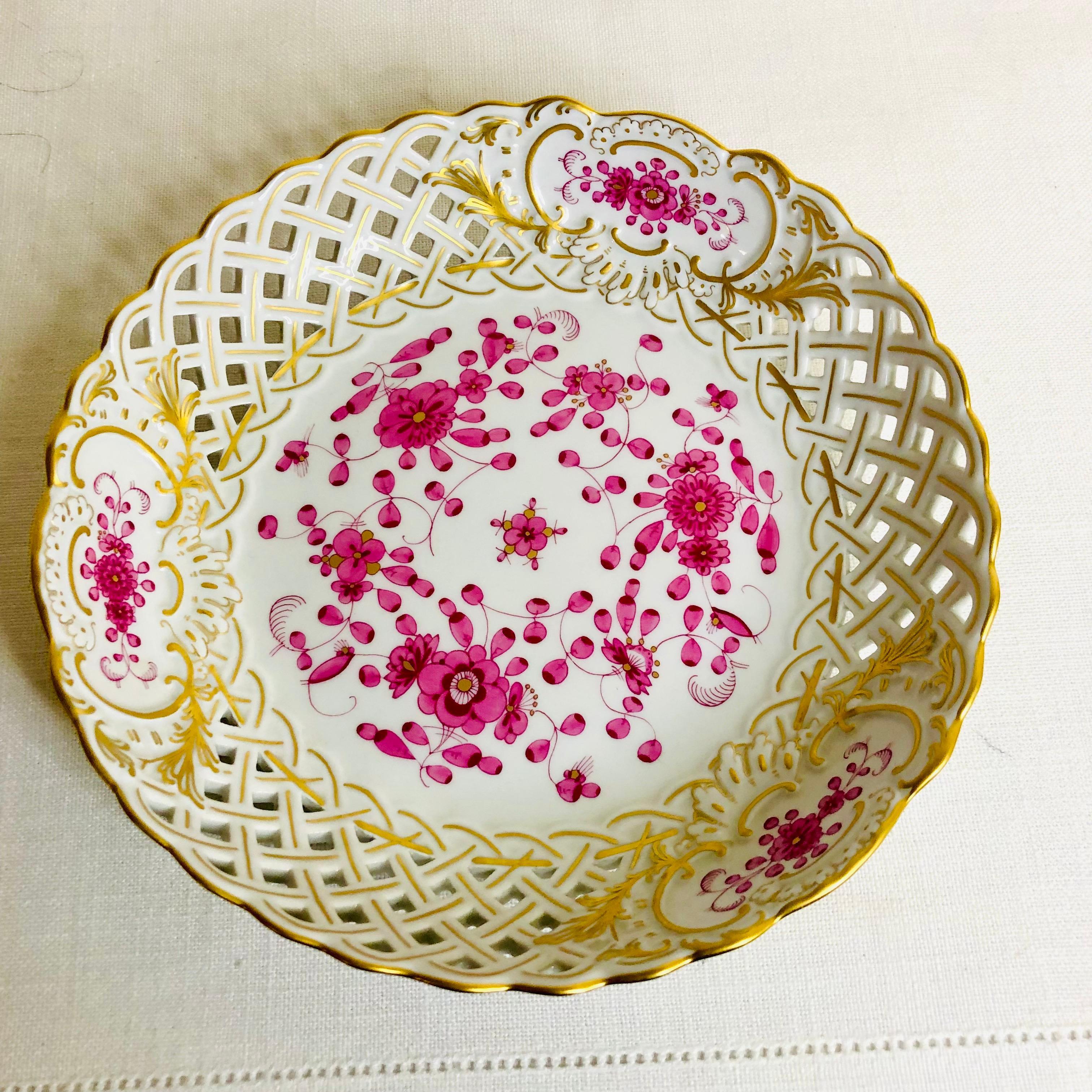 This is a beautiful round Meissen purple Indian reticulated serving bowl. The purple Indian pattern of Meissen is one of my favorite patterns as it has beautiful colors that are striking on its white ground. This pattern is cheerful and so very eye