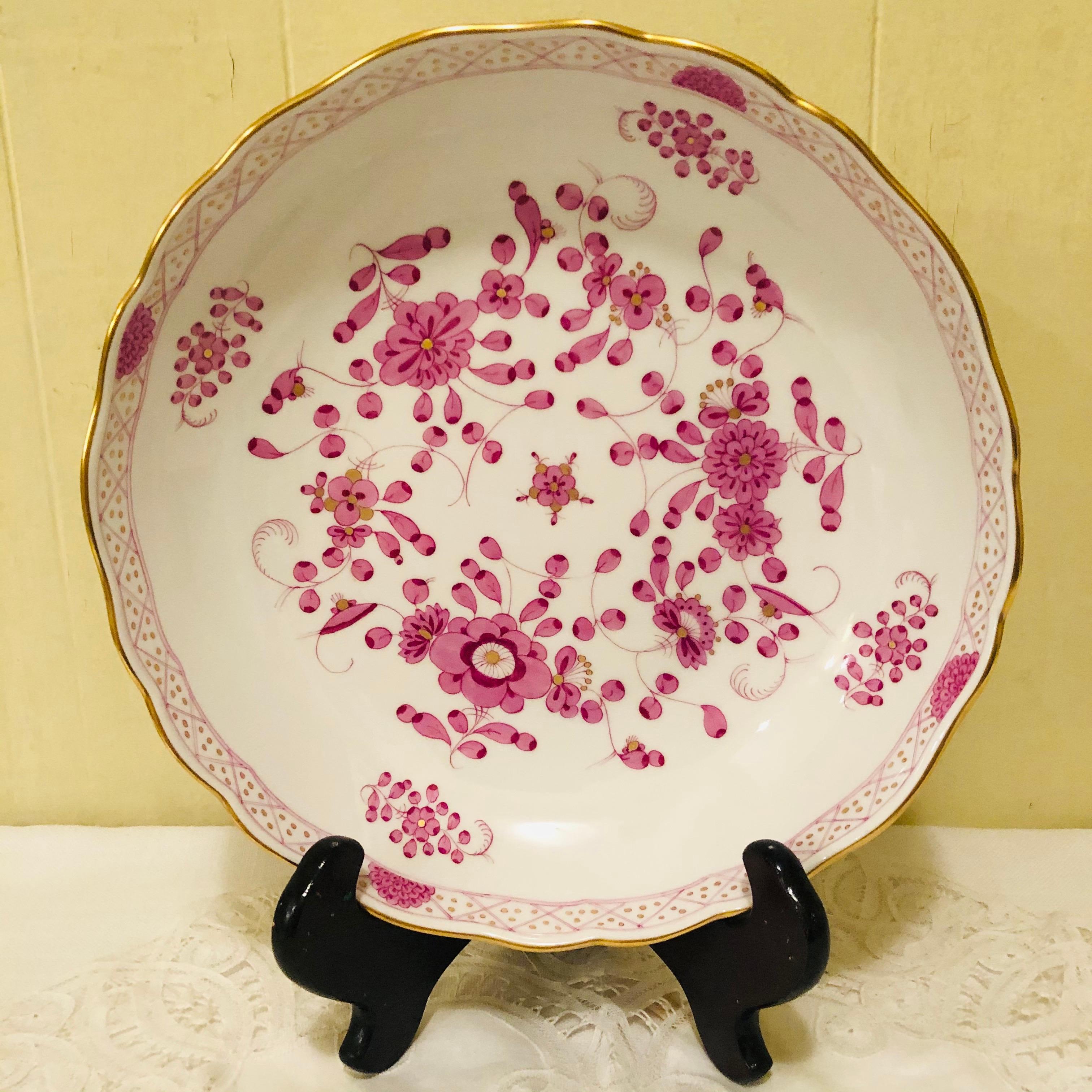 We are offering you this lovely Meissen purple Indian serving bowl.  It has detailed paintings of pink flowers with some purple and gold accents on a white ground. The detail of the painting on this serving bowl is beautifully done. It has a gold