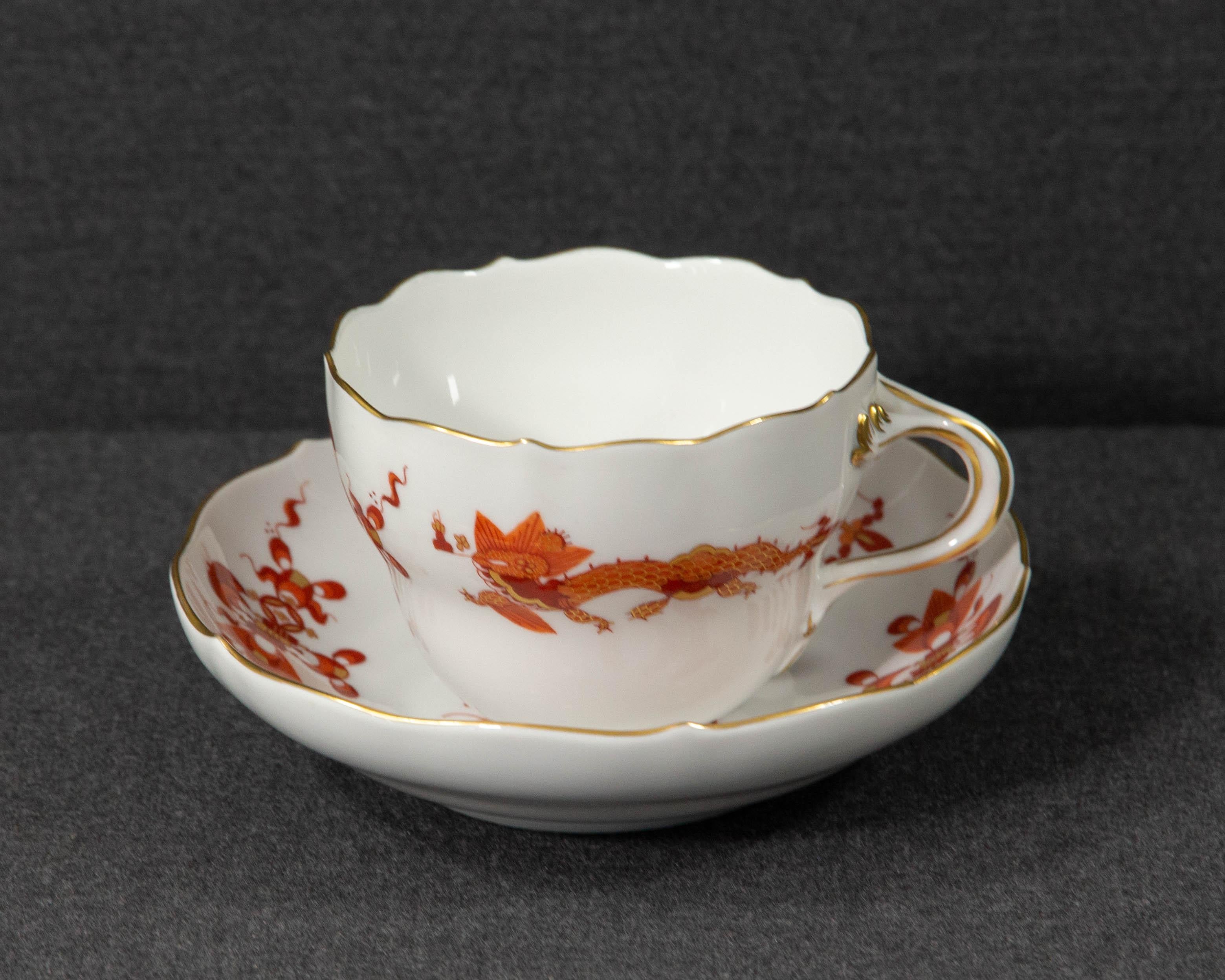 A Meissen red dragon teacup.

The teacup and saucer were made by Meissen and have been decorated with the 'Court Dragon' pattern in red. The items were made in the second half of the 20th century.

The item is made of white porcelain and is hand