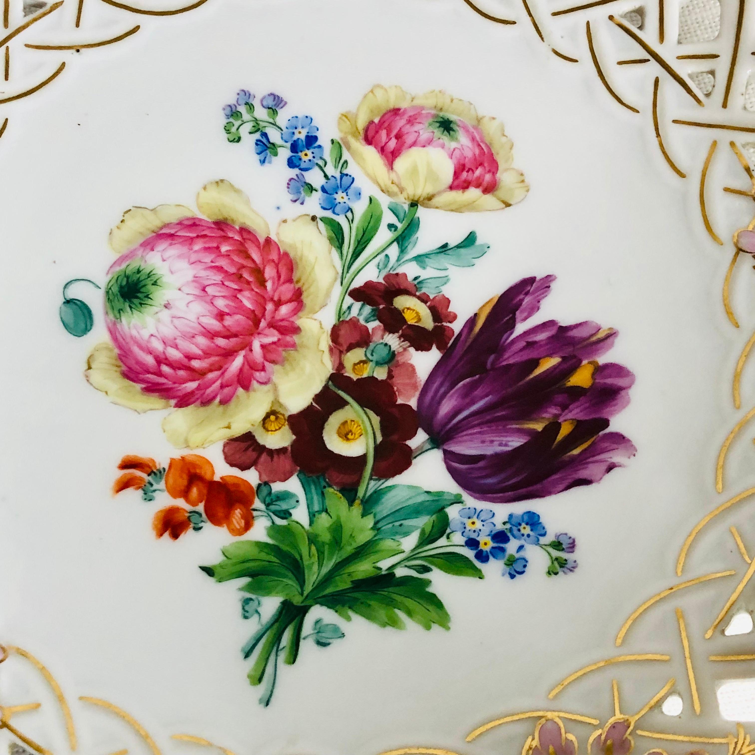 Late 19th Century Meissen Reticulated Fluted Bowl with a Bright & Colorful Central Flower Bouquet For Sale