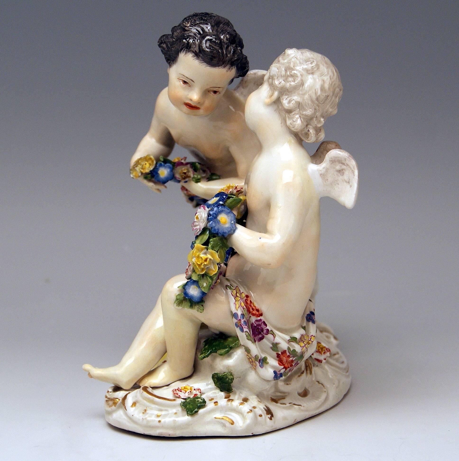 Painted Meissen Rococo Cherubs Cupids Figurines with Flowers Model 2372 Kaendler 1755-60 For Sale