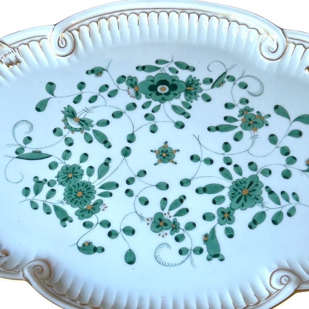 Excellent condition~no chips, cracks or crazing! Fine Meissen porcelain grand sized serving tray; the edge is a “ribbon” and scalloped design edged in outlined in bright gold; green floral design in a casual “folk art” style; an elegant serving