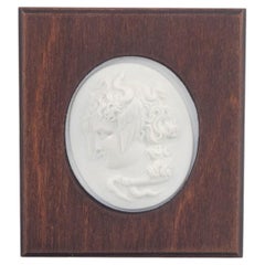 Meissen. Small relief plaque in white biscuit porcelain depicting Medusa. 1970s
