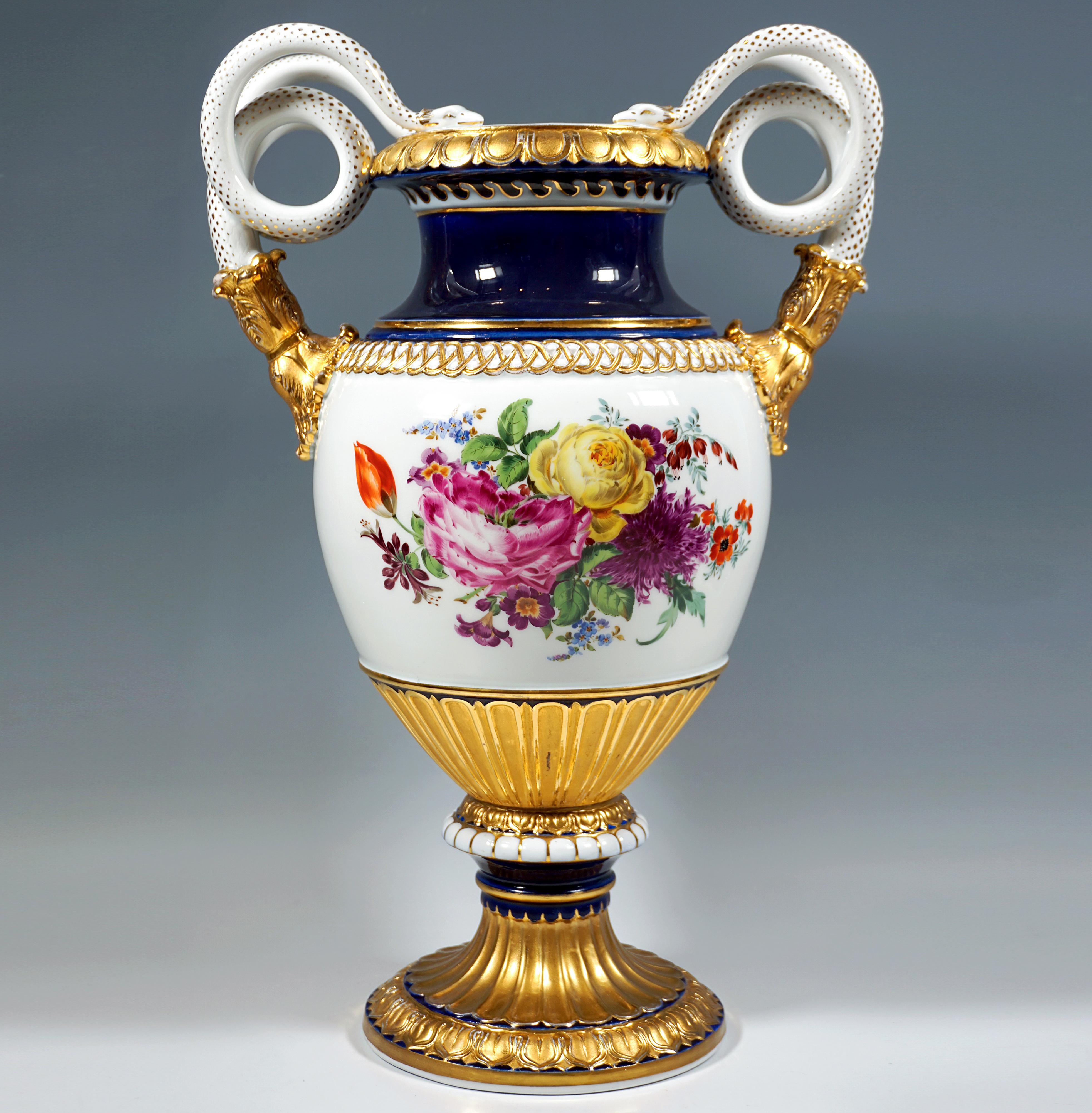 Very large double snake handle vase in baluster form on a mounted funnel-shaped stand, handles in the form of coiled snake pairs raised on the side, white and cobalt blue base, fine polychrome bouquet painting on the front and back, rich matte and