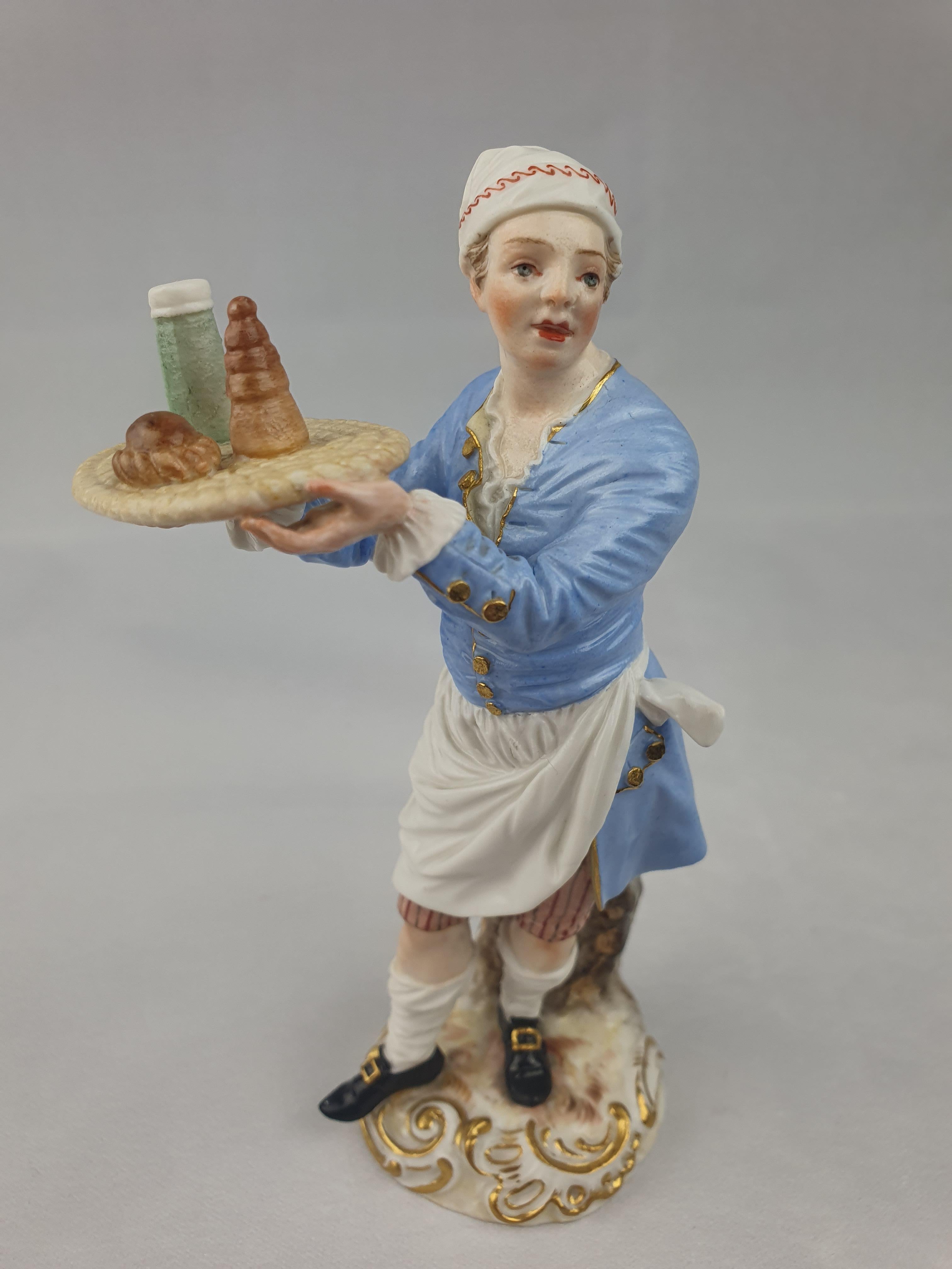 Late 19thc Meissen street trader waiter from the series of 35 figures known as the Cris of Paris.

Number 1
Height 13.5cm
Cross swords in underglaze blue
Circa 1880.