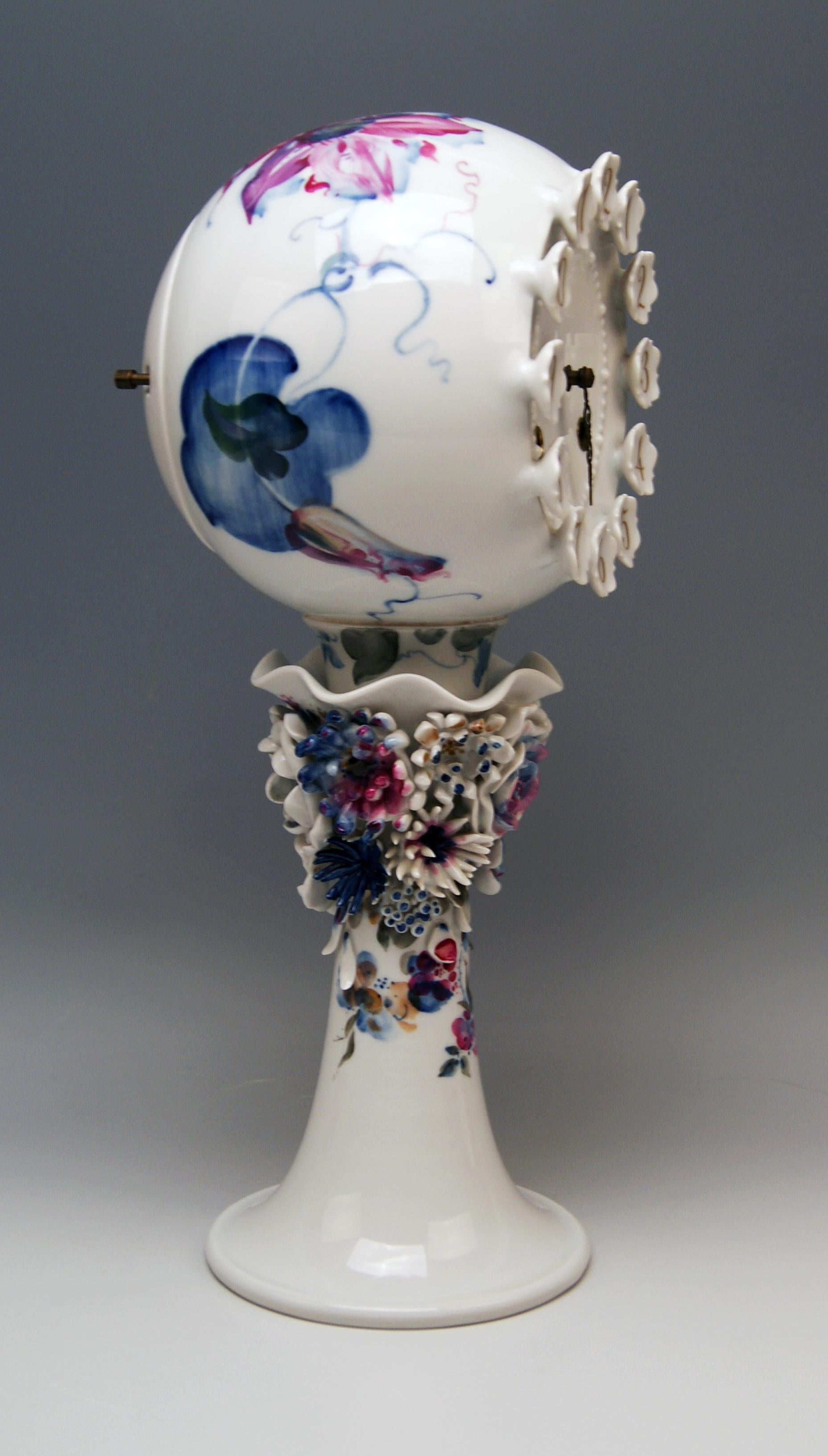 Meissen gorgeous rare table clock of finest manufacturing quality.
Measures: height 38.5 cm (= 15.15 inches)
diameter 17.5 cm (= 6.88 inches)

Manufactory: Meissen
Hallmarked: Blue Meissen Sword Mark (underglazed)
First quality
Model 60886 /