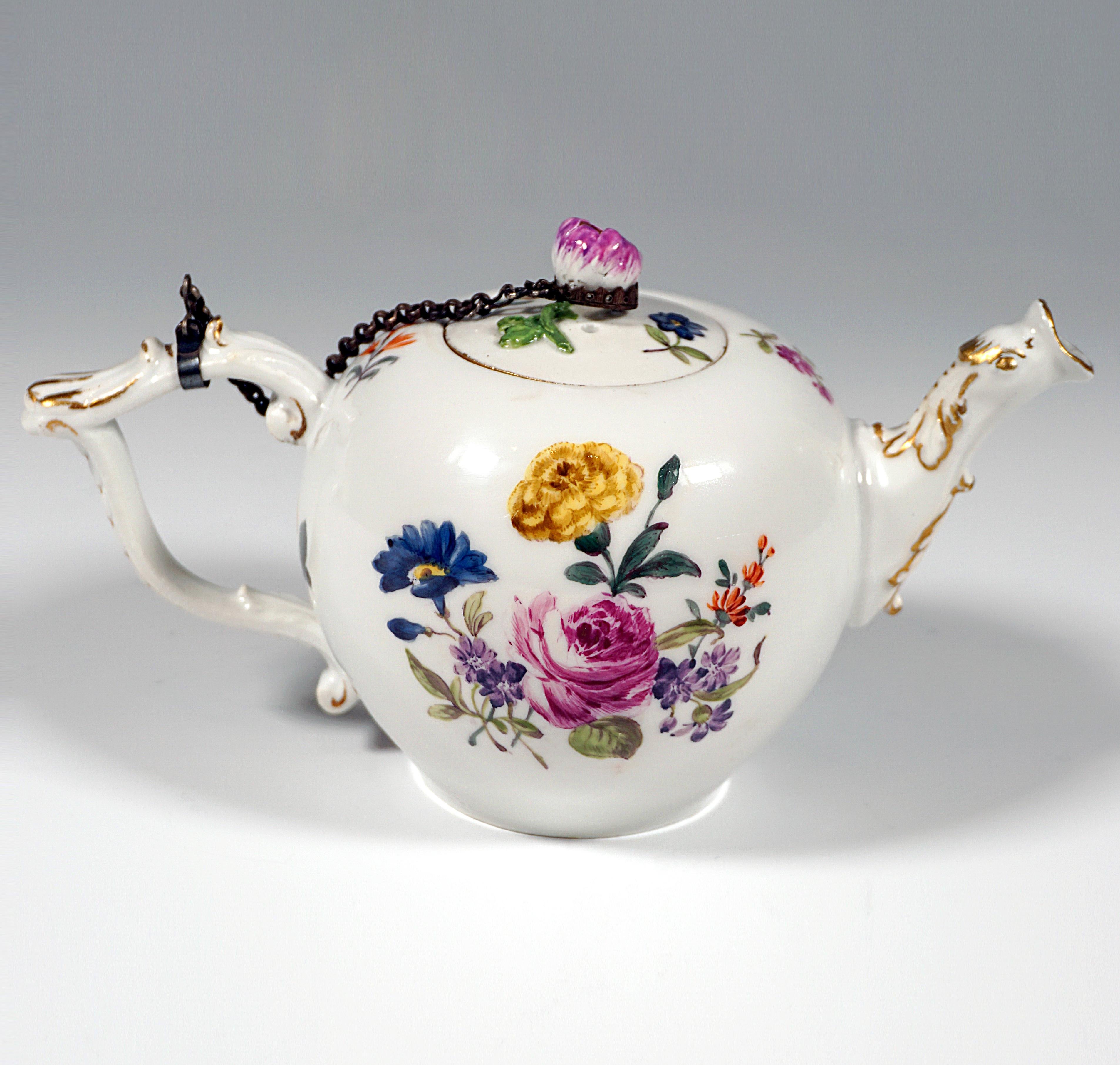 Very Early And Rare Piece From The Meissen/Germany Manufactory:
Teapot, made circa 1750, the belly of the pot painted on the front and back with large floral arrangements, scattered floral painting in between and on the lid, sculpted flower bud as