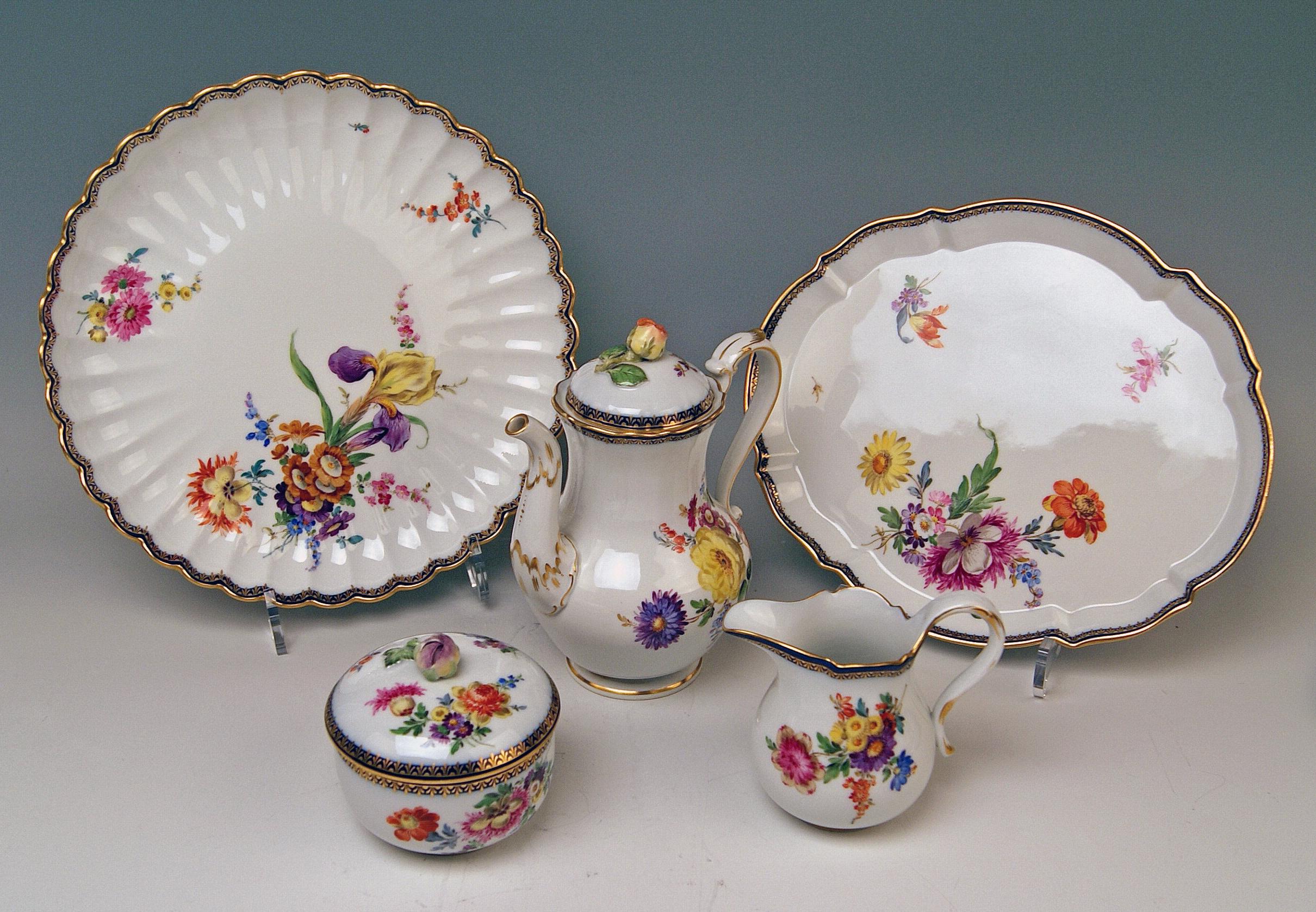 We invite you here to look at a splendid Meissen tea set for six persons: 

This tea set is of finest appearance due to gorgeous various multicolored flower paintings:
Flower bouquets and smaller flowers laid on white porcelain = this decoration