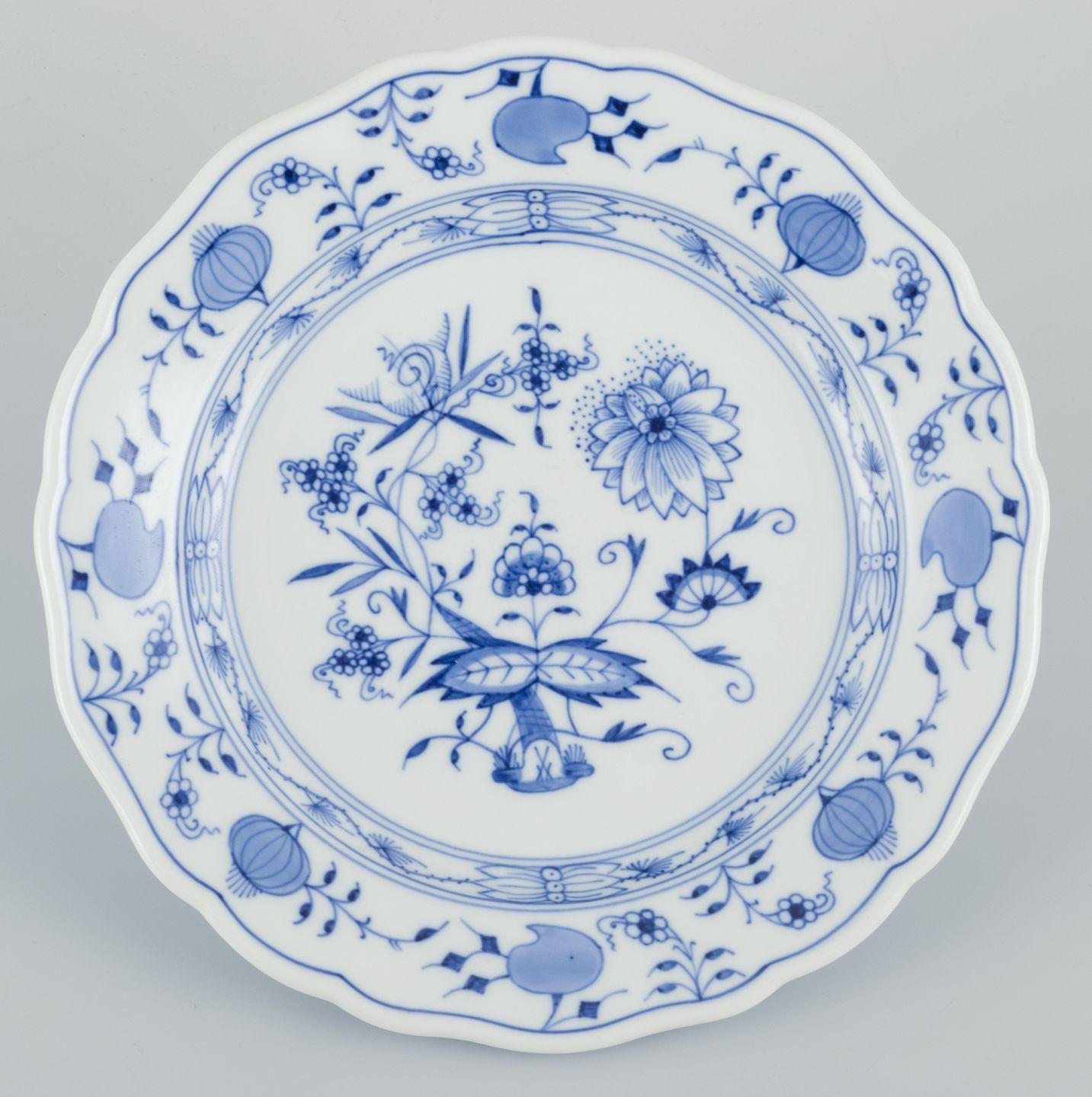 Hand-Painted Meissen, three Blue Onion patterned plates in porcelain. Early 20th C. For Sale