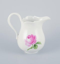 Meissen, three pieces of "Pink Rose" a plant pot, milk jug, and a tea caddy.
