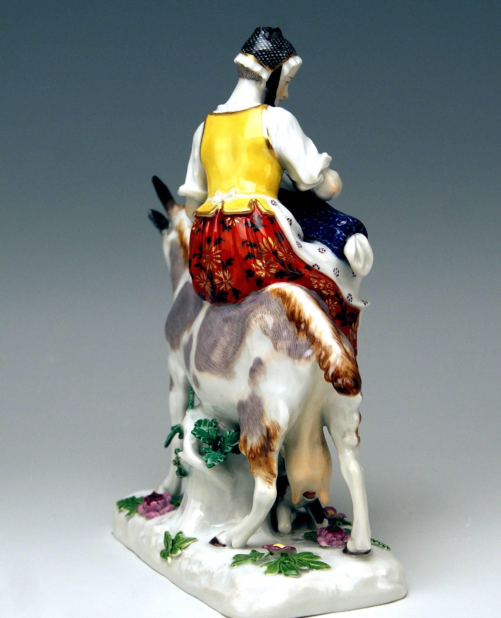 woman riding goat