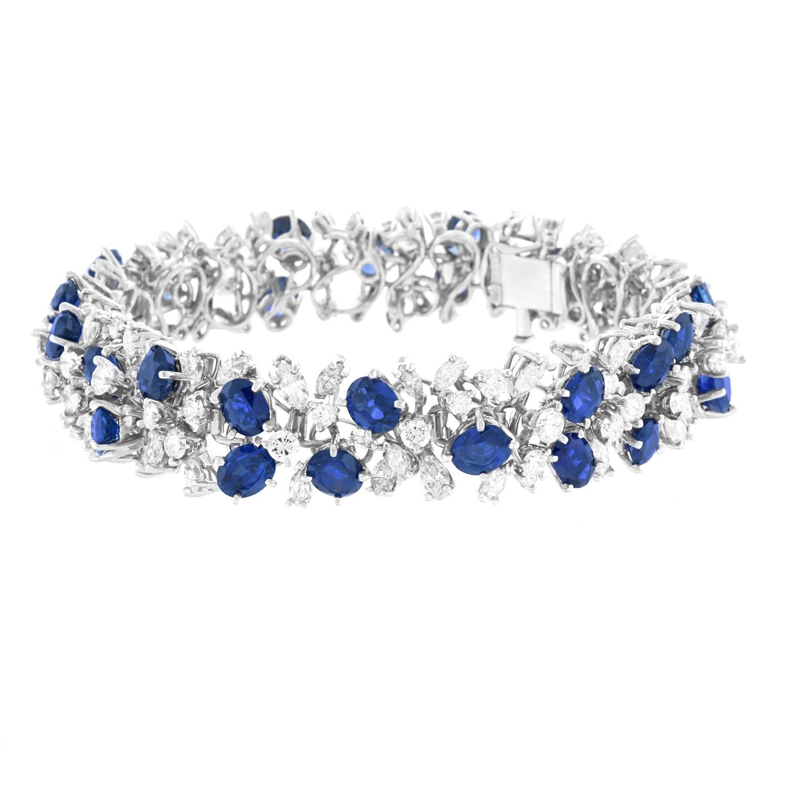 Necklace-        Circa 1960s, 18k, by Emil Meister, Zurich, Switzerland. Set with an incredible 30.0 carats of sublime blue sapphires and 35.0 carats of brilliant white diamonds (G color, VS clarity), this one-of-a-kind necklace from the esteemed