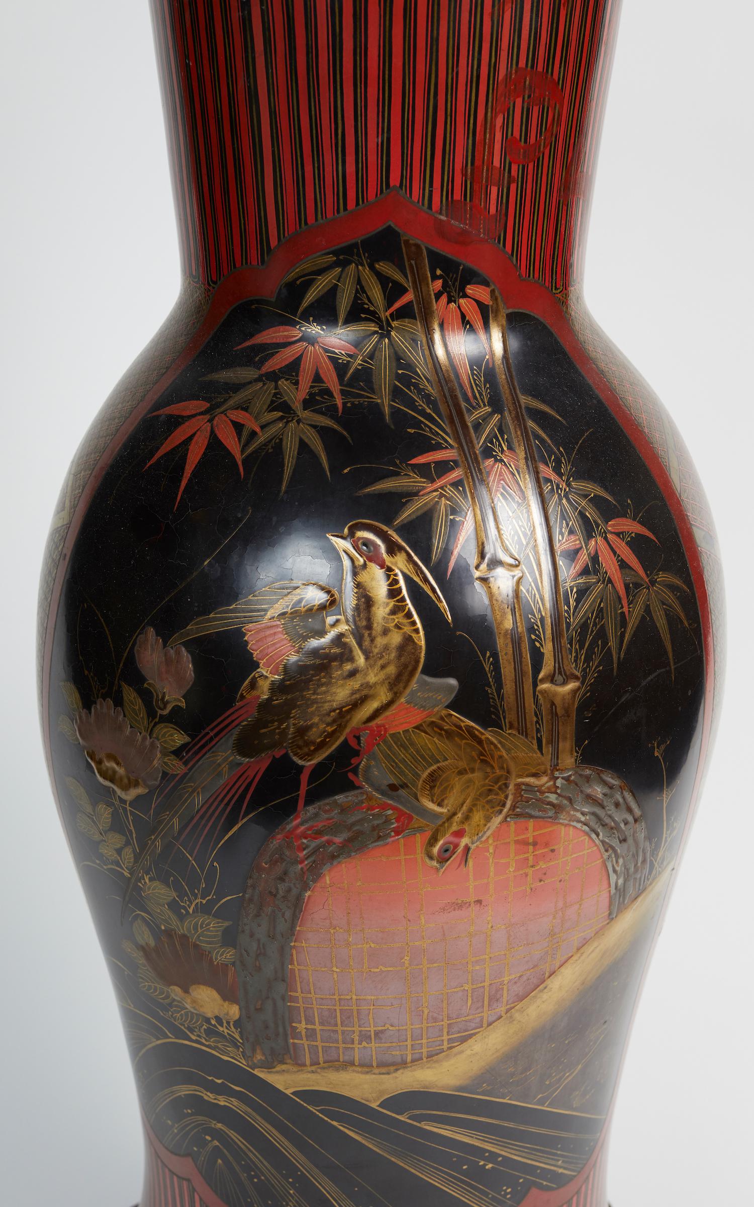 Japanese ceramic vase representing the Mont Fuji resting on a bronze base.