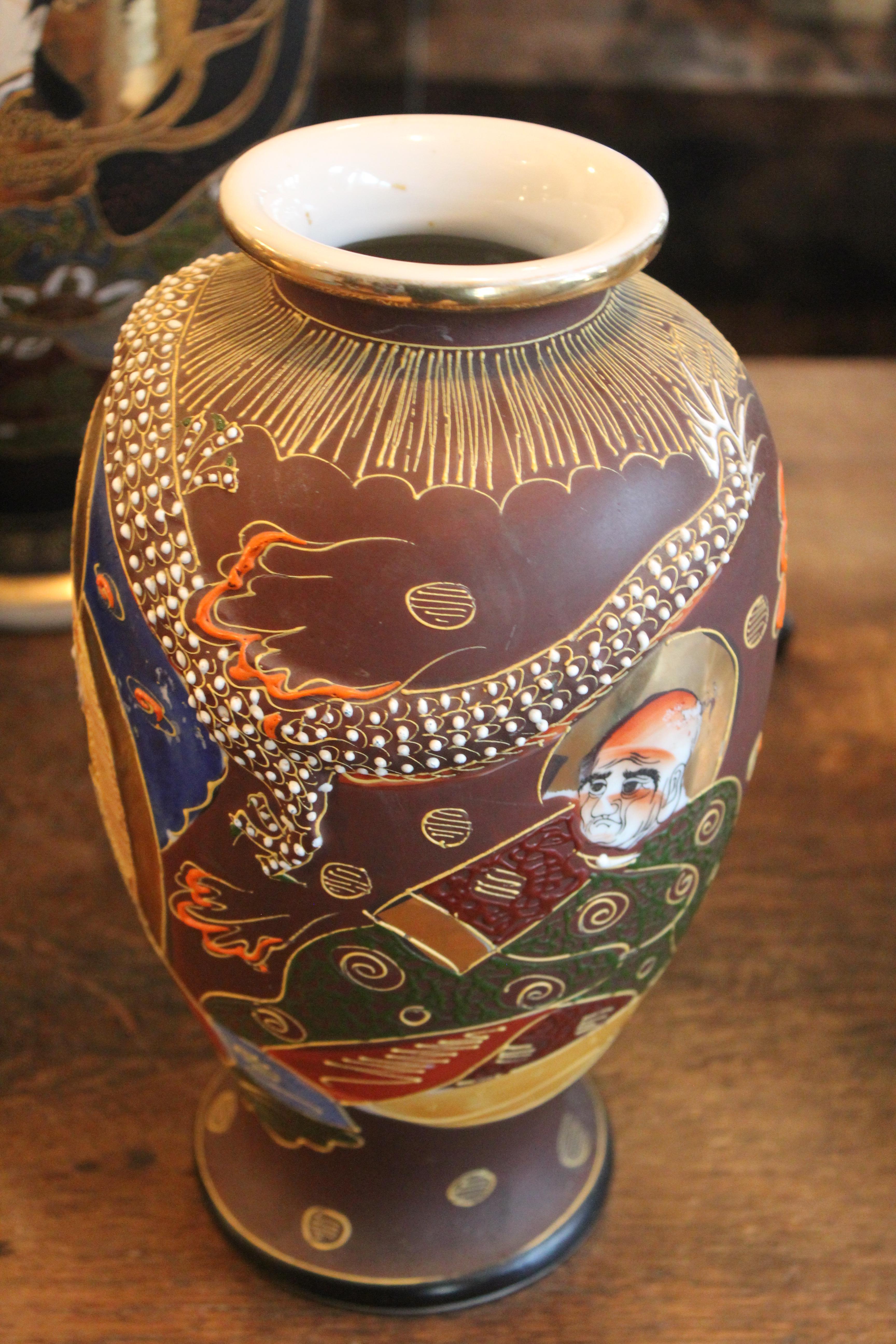 Mejii early 20th century Satsuma vase 

Our 10 “tall by 6” wide (+/-) Mejii early 20th century vase has the most wonderfully detailed raised elements, see photo. It is stamped made in Japan denotes 20th century dating. Please view all photos and