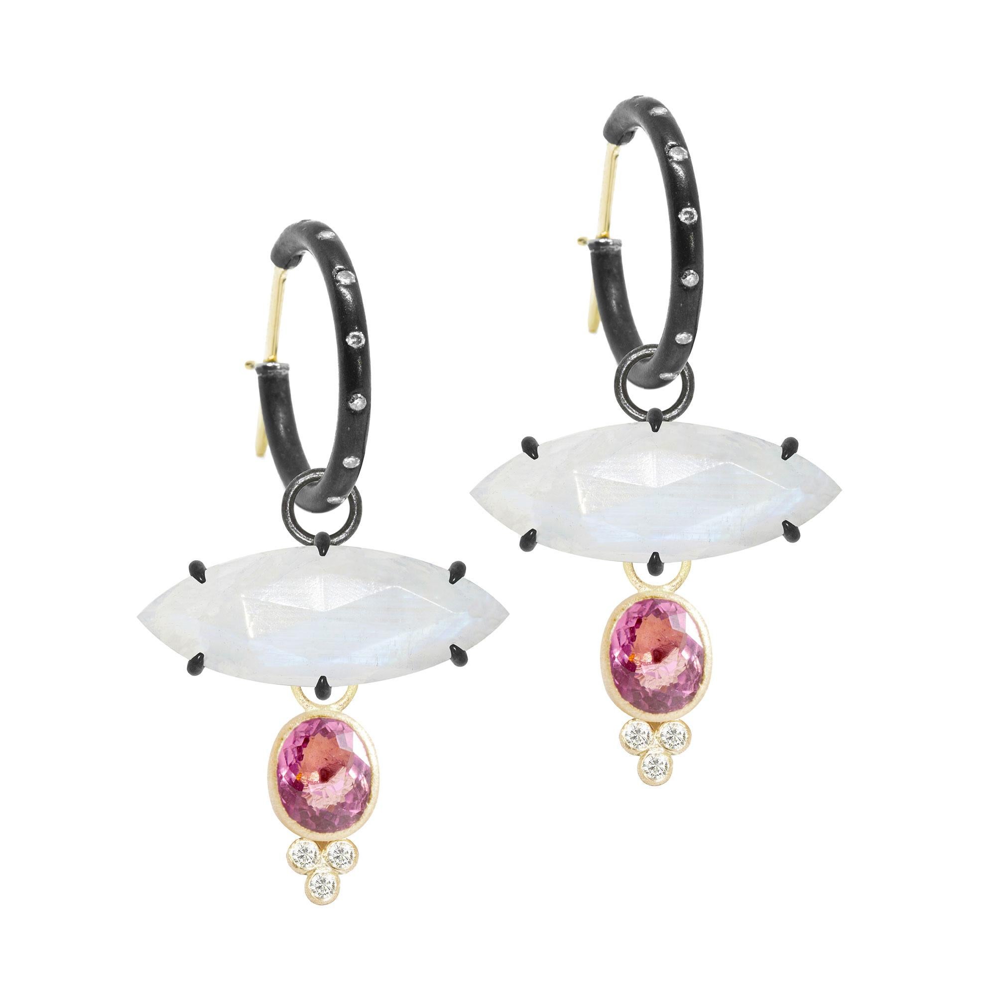 Designed with bezel-set pink tourmaline stones, the diamond-accented Lilly Gold Charms embrace the shape of a drop of water—an essential element for life—and bring a little edge to any of our hoop styles.
Nina Nguyen Design's patent-pending earrings