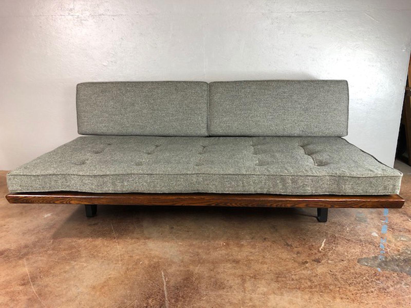 Superb daybed by Mel Bogart for Felmore. Reupholstered. Very well built and crafted. Bottom portion of daybed pulls forward, allowing a roomy extra sleeping surface, circa 1950s. Sofa bottom is 48
