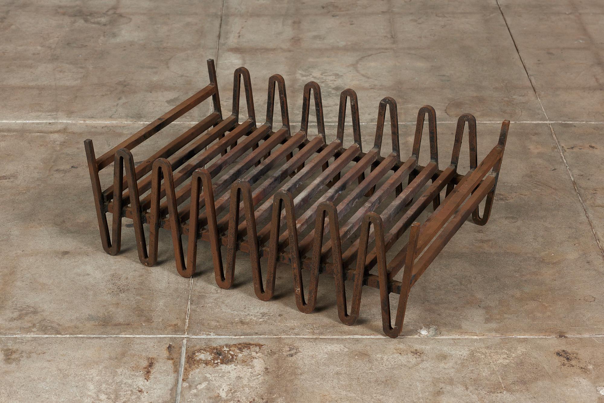 Custom designed double sided fire grate by Mel Bogart for Felmore Associates, USA, c.1950s. This grate was a custom piece for Craig Ellwood designed, Zimmerman House, located in the West Los Angeles community of Brentwood. This wrought iron design