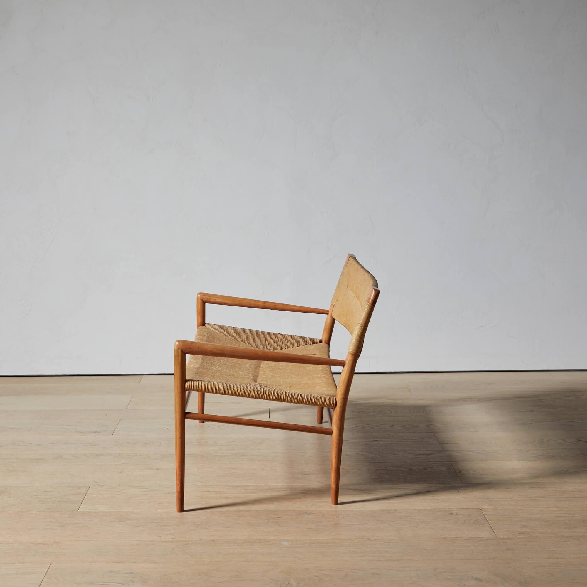 Tissage Banc Mel Smilow avec assise et dossier en jonc tissé en vente
