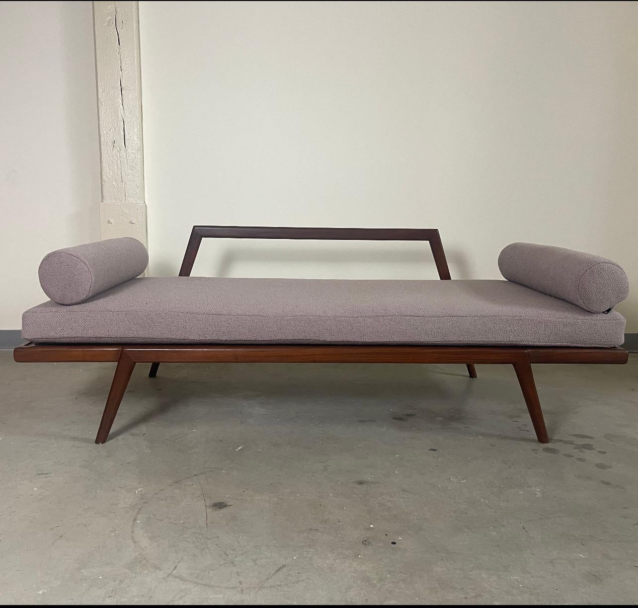 Walnut daybed by Mel Smilow. Professionally refinished and reupholstered in a beige wool boucle fabric.