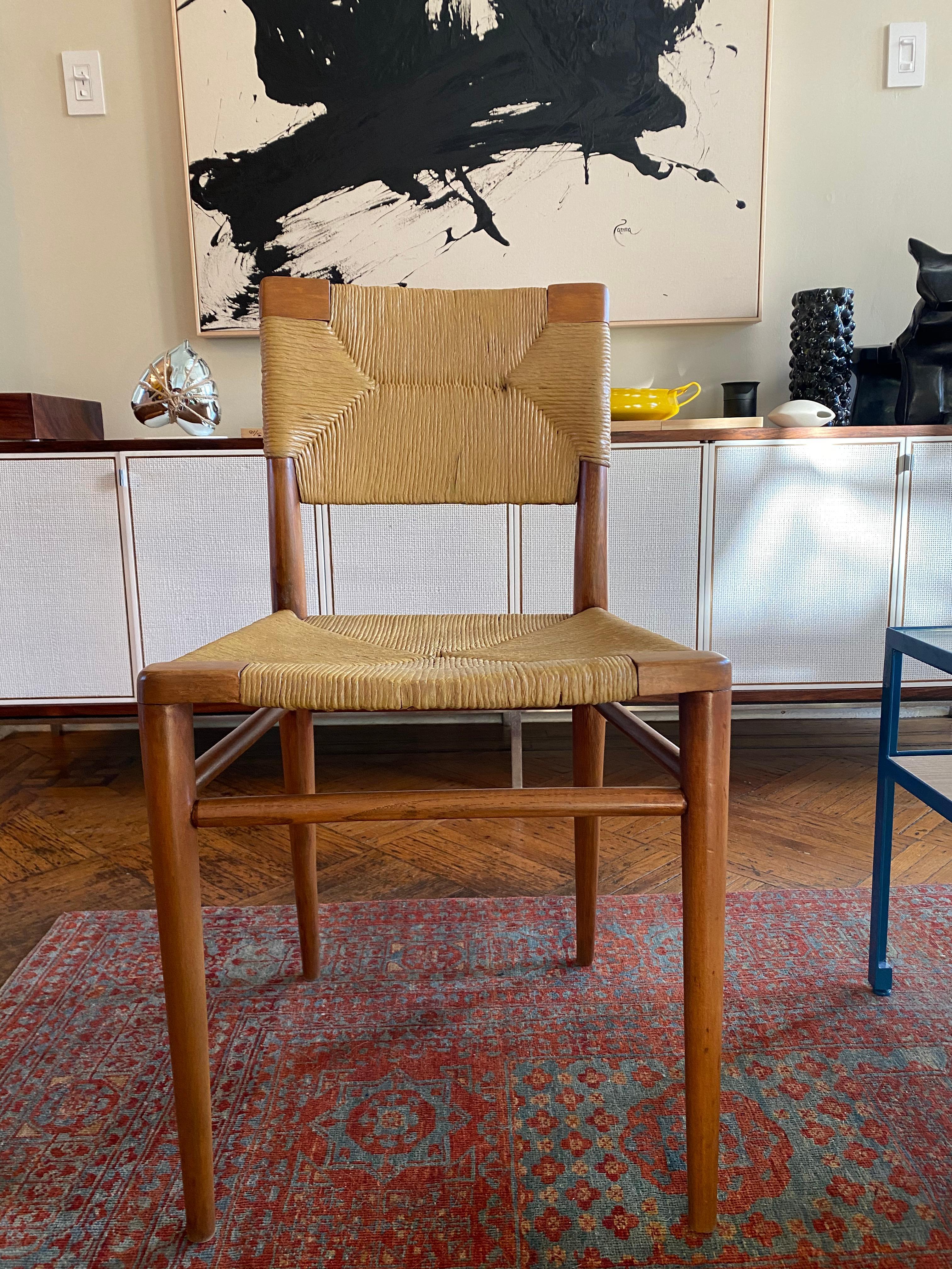 Original rush and walnut side chair designed by Mel Smilow in 1956. Natural paper cord seat and back on sturdy tapering wood frame.