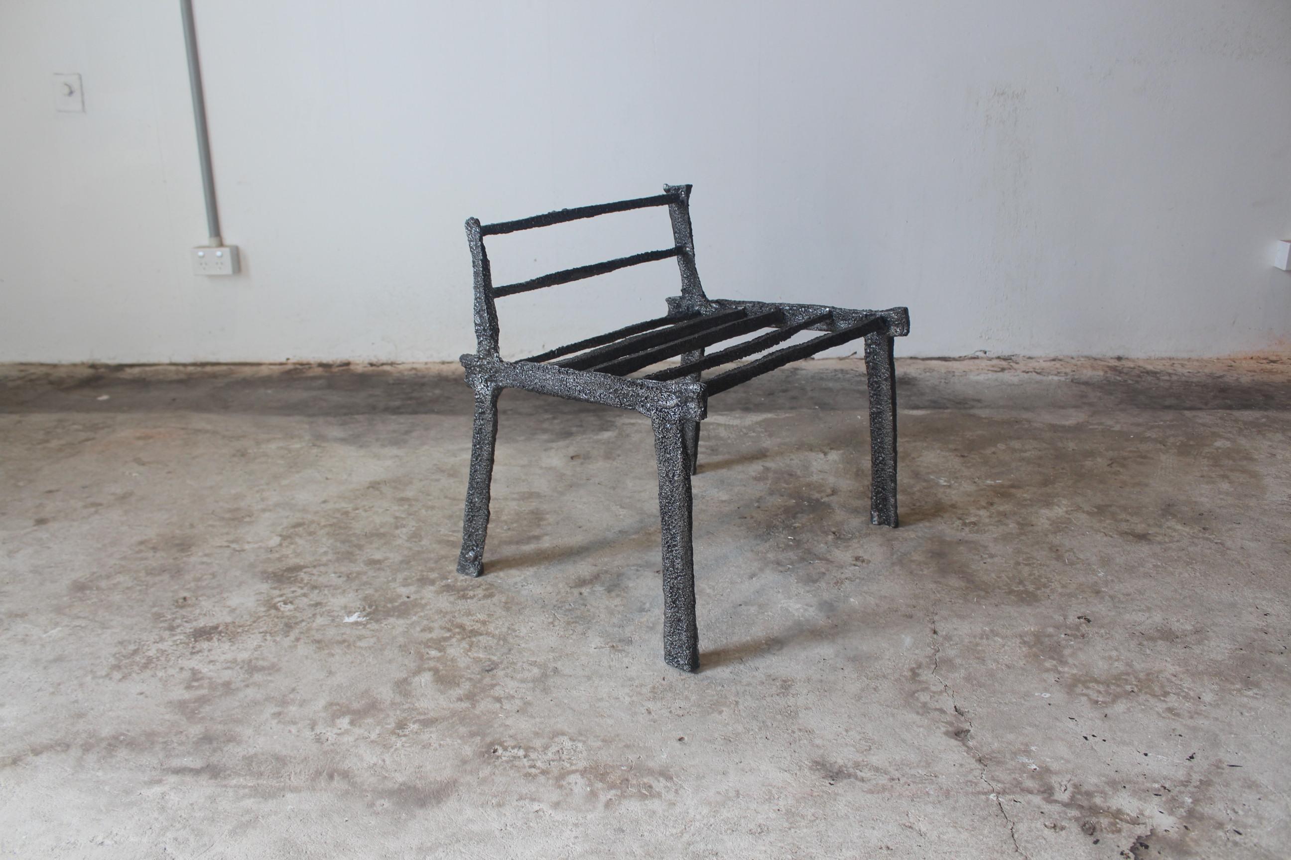 Melancholy Chair by Saturday Yard Work
Dimensions: W 60 x D 50 x H 60 cm
Materials: Aluminium.
Finish: Blackened texture. 

SATURDAY YARD WORK by Nathan Martin is a Kaurna/Adelaide based practice that aims to find a medium between sculpture, craft,
