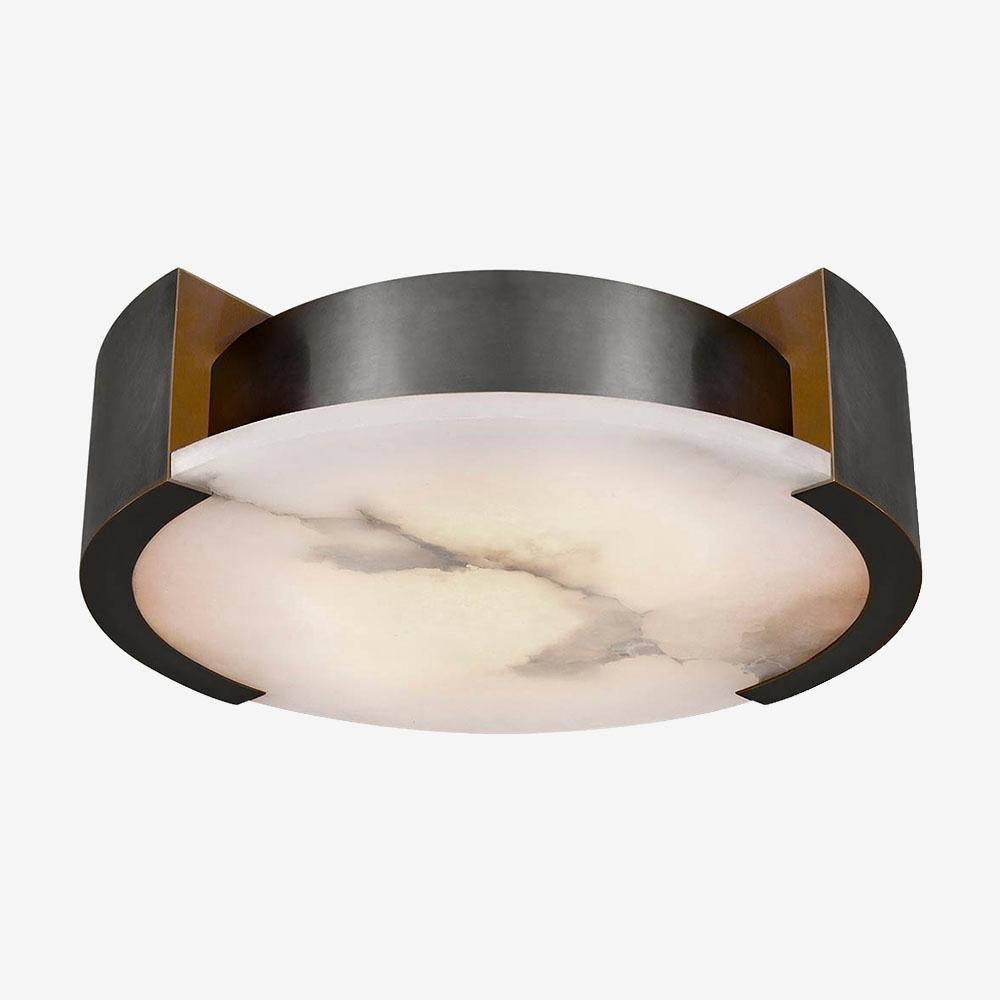 Effortlessly pairing natural alabaster and sleek metal detailing in a streamlined geometric form, the Melange large flush mount exudes a modern refinement while emphasizing the beauty of natural stone. This fixture features hand-carved natural