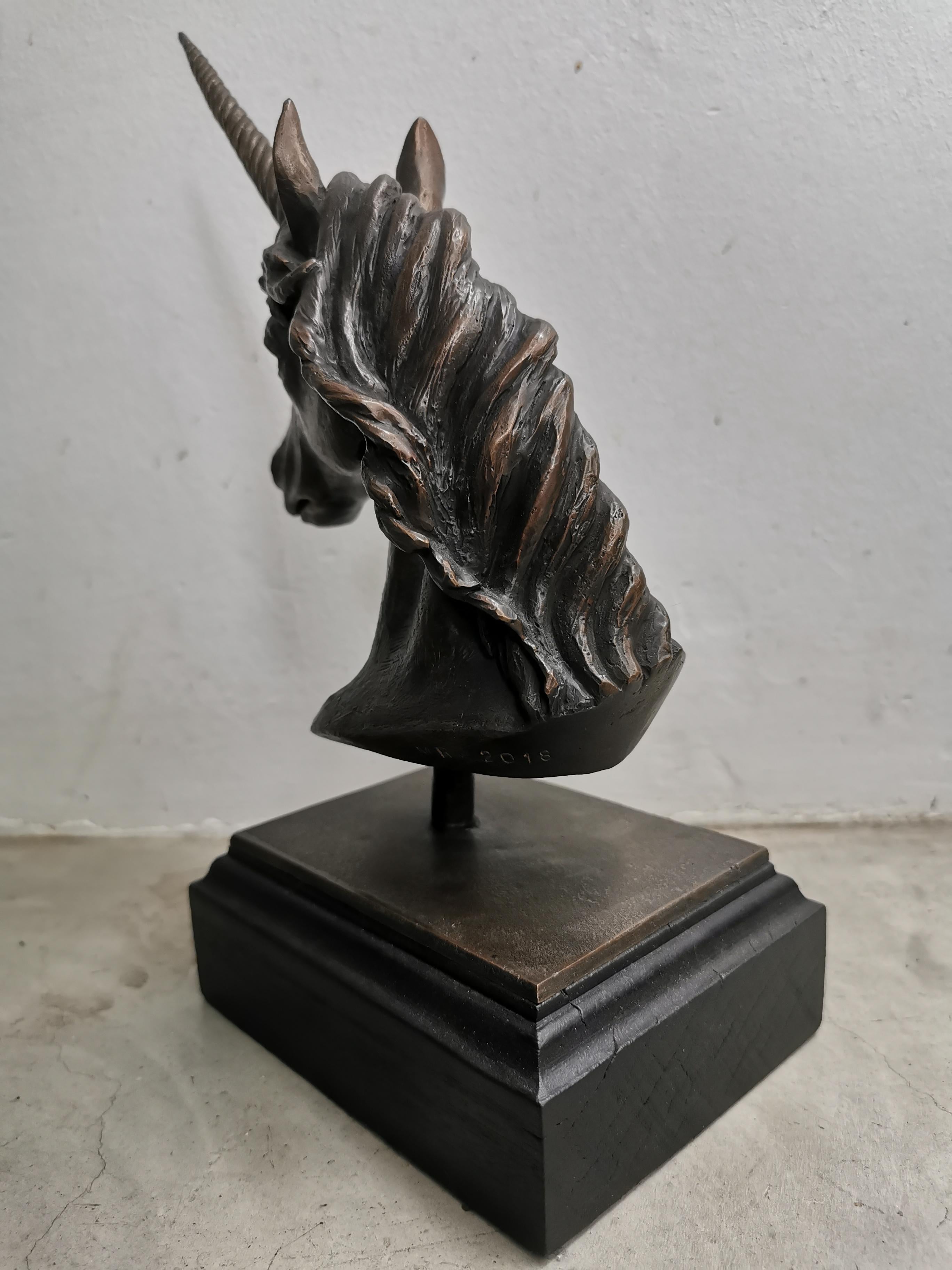 bronze unicorn statue