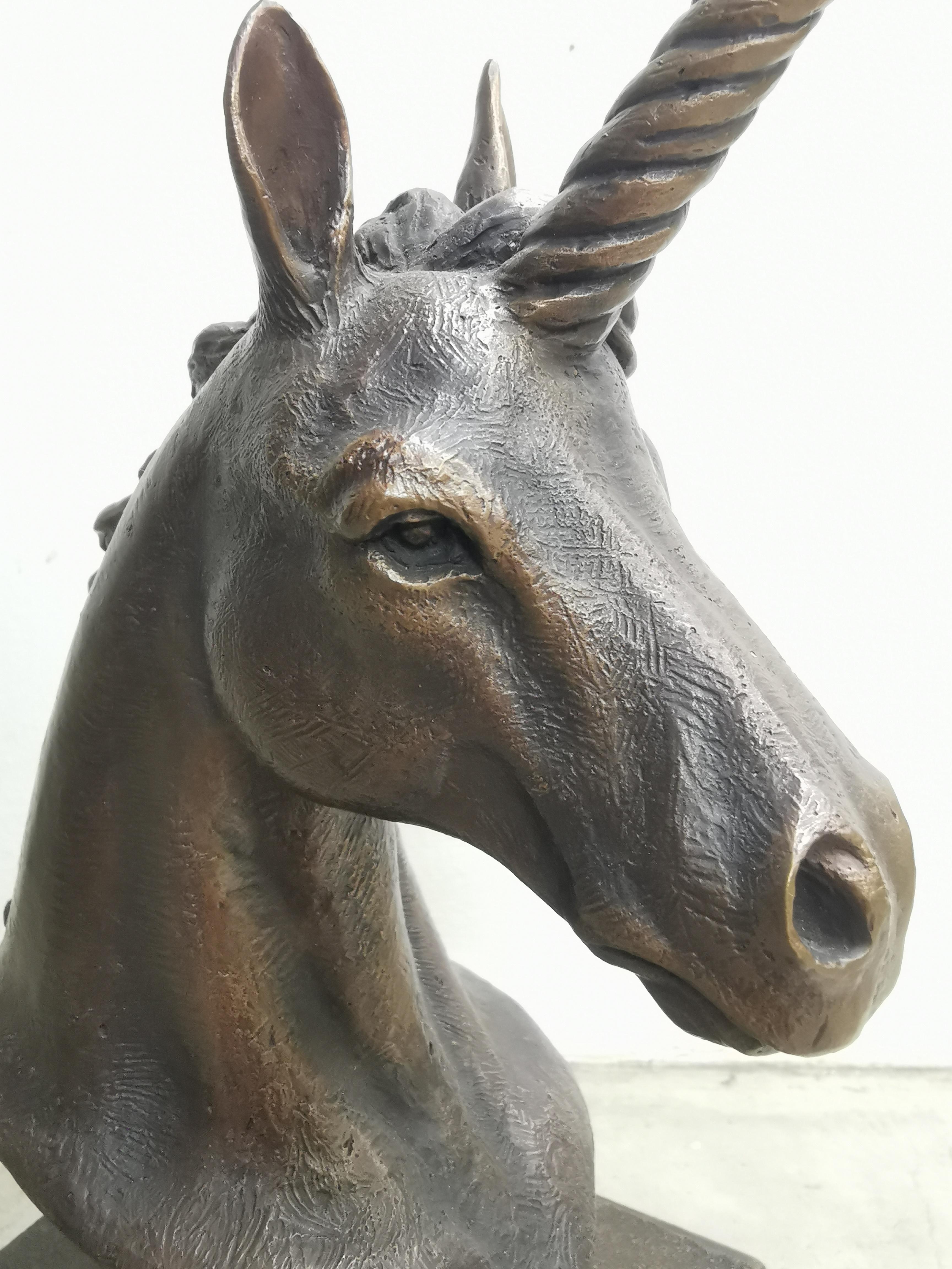 A small, limited edition bronze unicorn bust sculpture on a wooden base. Edition of 12.
FREE SHIPPING