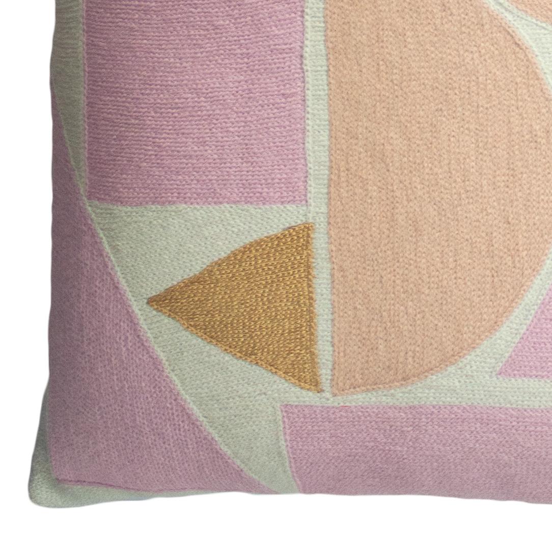 These geometric pastel throw pillows have been ethically hand embroidered by artisans in Kashmir, India, using a traditional embroidery technique which is native to this region.

The purchase of this handcrafted pillow helps to support the artisans