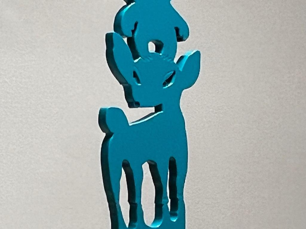 They Help Each Other - Animal Stack Sculpture, by Melanie Yazzie, Navajo, teal
limited edition 
aluminum with powder coat finish

The animals rest on a base that is secured by the dog's tail.

As a printmaker, painter, and sculptor, my work draws