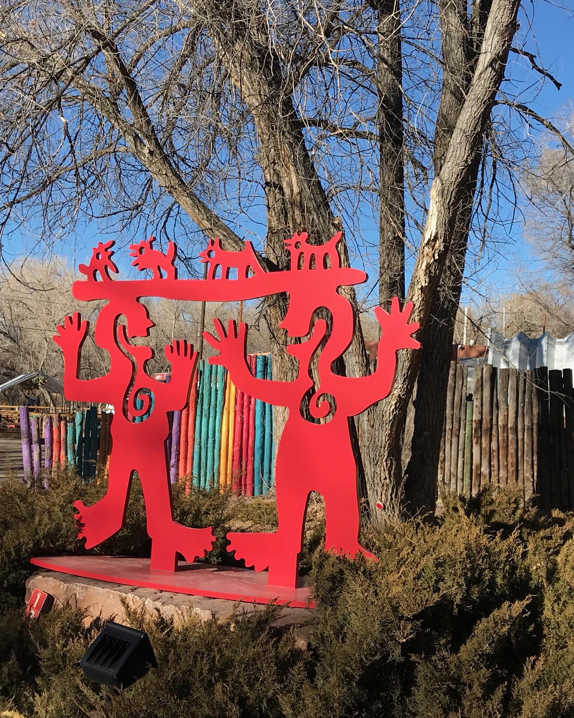 Two Minds Meeting, Melanie Yazzie large red sculpture, animals, people, Navajo 3