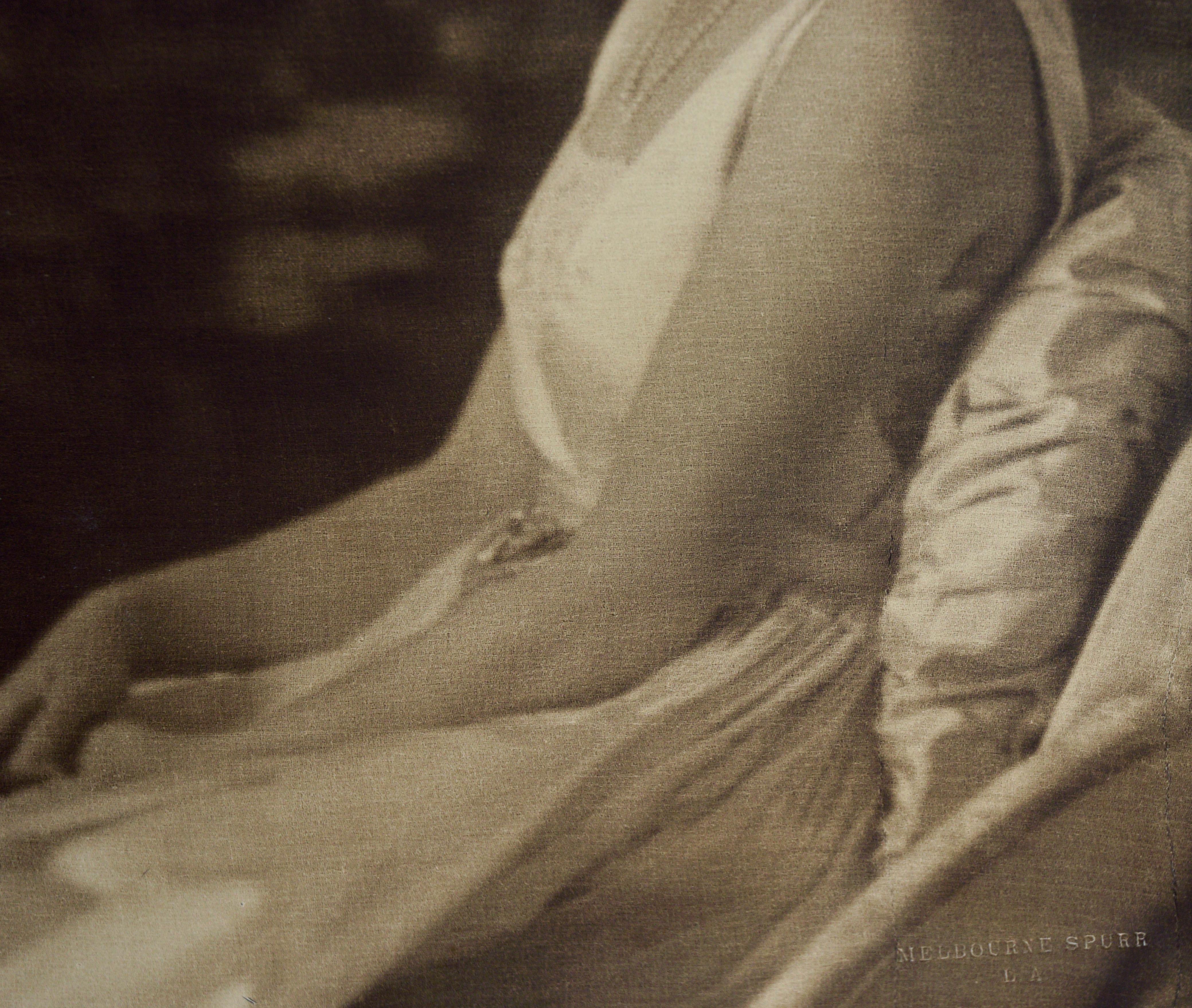 Photograph of Mary Pickford - Melbourne Spurr Photography

Photograph depicting Mary Pickford by Hollywood photographer Melbourne Spurr (Canadian-American, 1892-1979). Mary Pickford is depicted wearing a white sleeveless dress, sitting in a lounge
