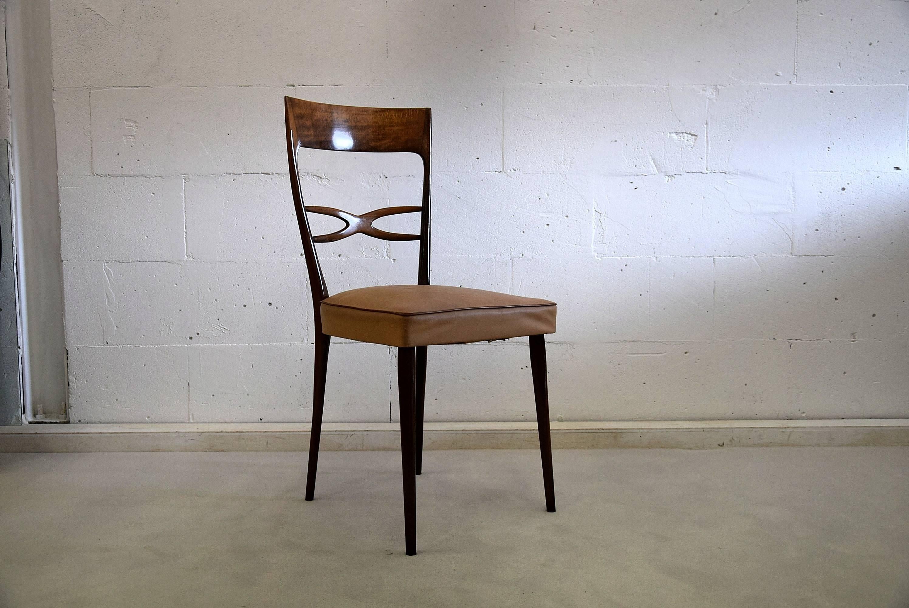 Four elegant and sophisticated walnut dining chairs attributed to Melchiorre Bega in the 1950s.
The chairs are in great condition but we do recommend re-upholstery.
Two chairs are slightly higher.

Measurements: H.93 + 95 x D.45 xW.44 cm.