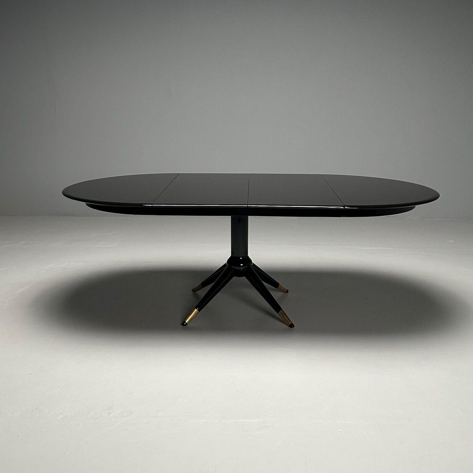 Melchiorre Bega, Italian Mid-Century Modern, Dining or Center Table, Table, Black Lacquer

Dining table with two leaves designed by Melchiorre Bega (1898-1976) for the Hotel Bristol in Merano, Italy, circa 1950s. A matching set of eight dining room