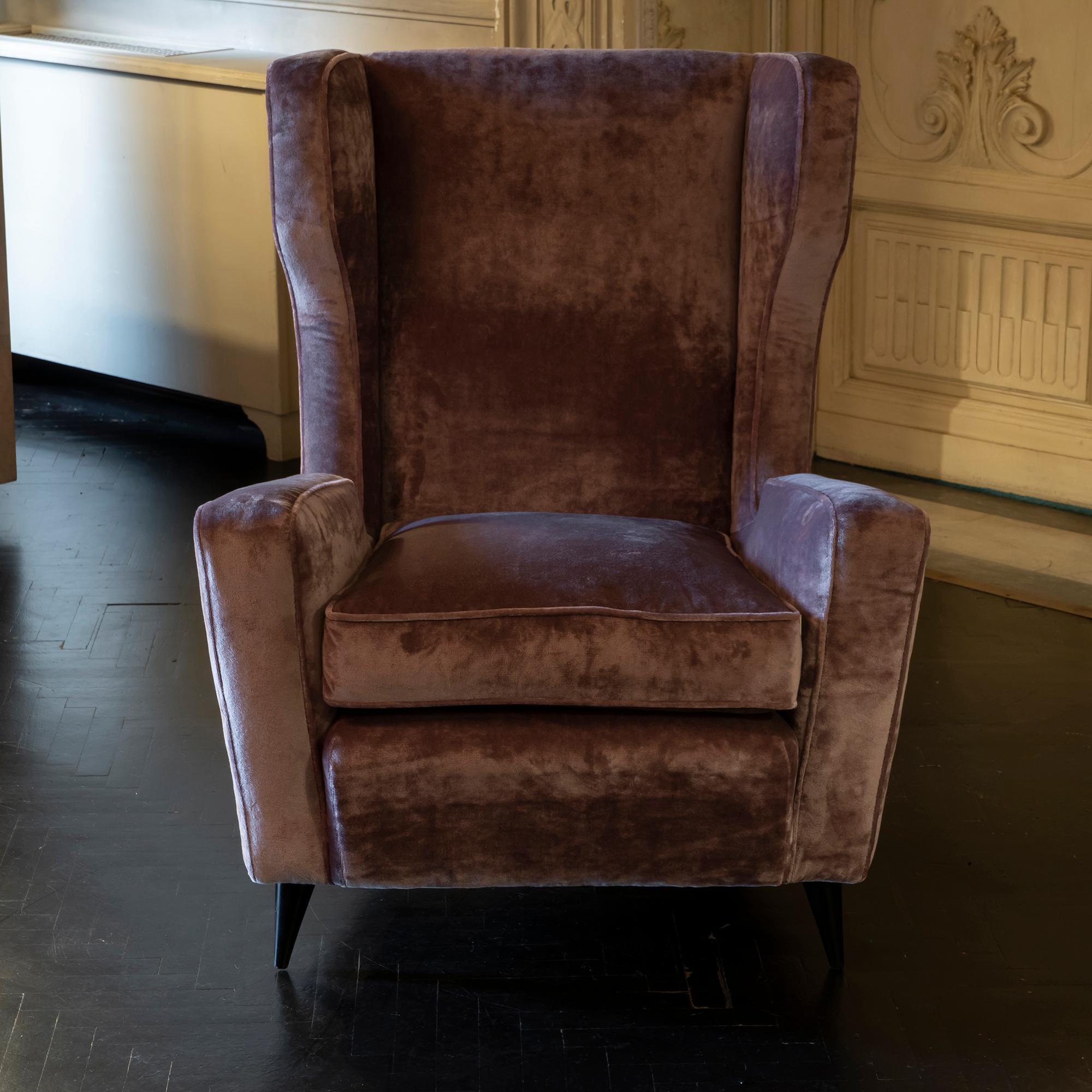 Pair of Melchiorre Bega armchairs newly reupholstered in mauve cotton/viscose velvet, original black walnut feet, Italy 1950.