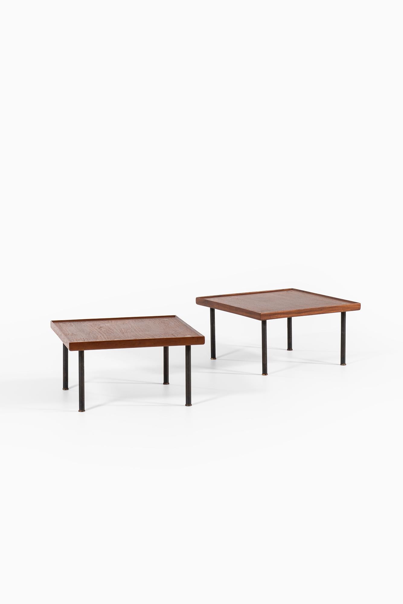 Rare pair of side tables designed by Melchiorre Bega. Produced by Klan in Italy.