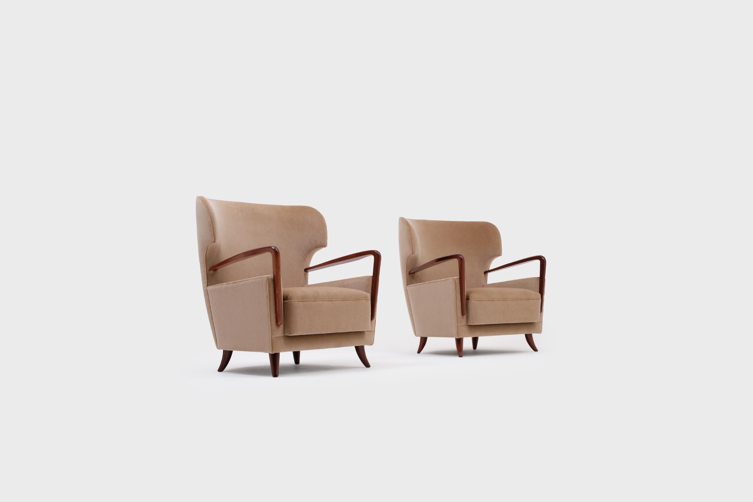 Mid-Century Modern Melchiorre Bega Wingback Armchairs, Italy, 1950s