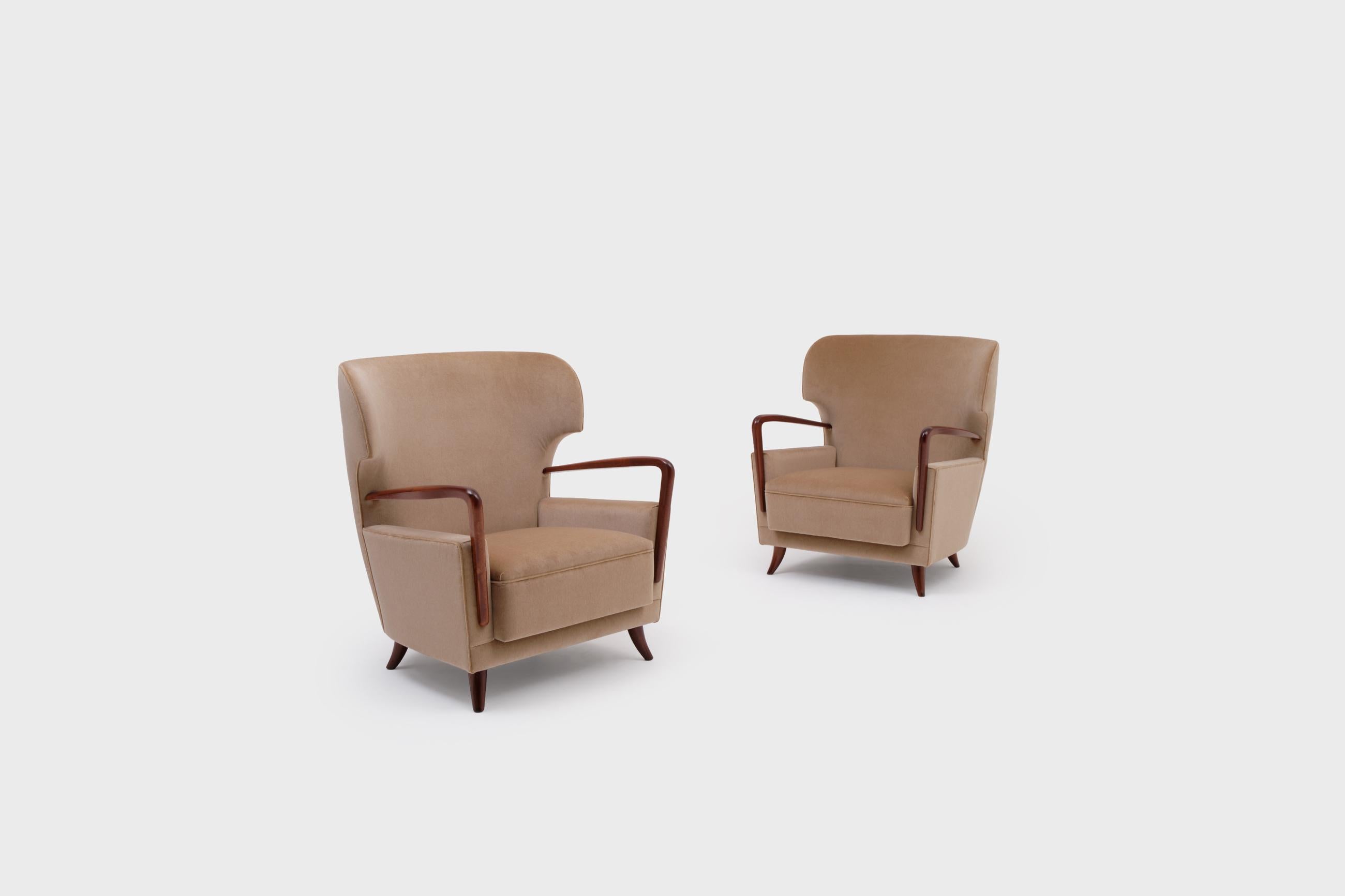 Italian Melchiorre Bega Wingback Armchairs, Italy, 1950s