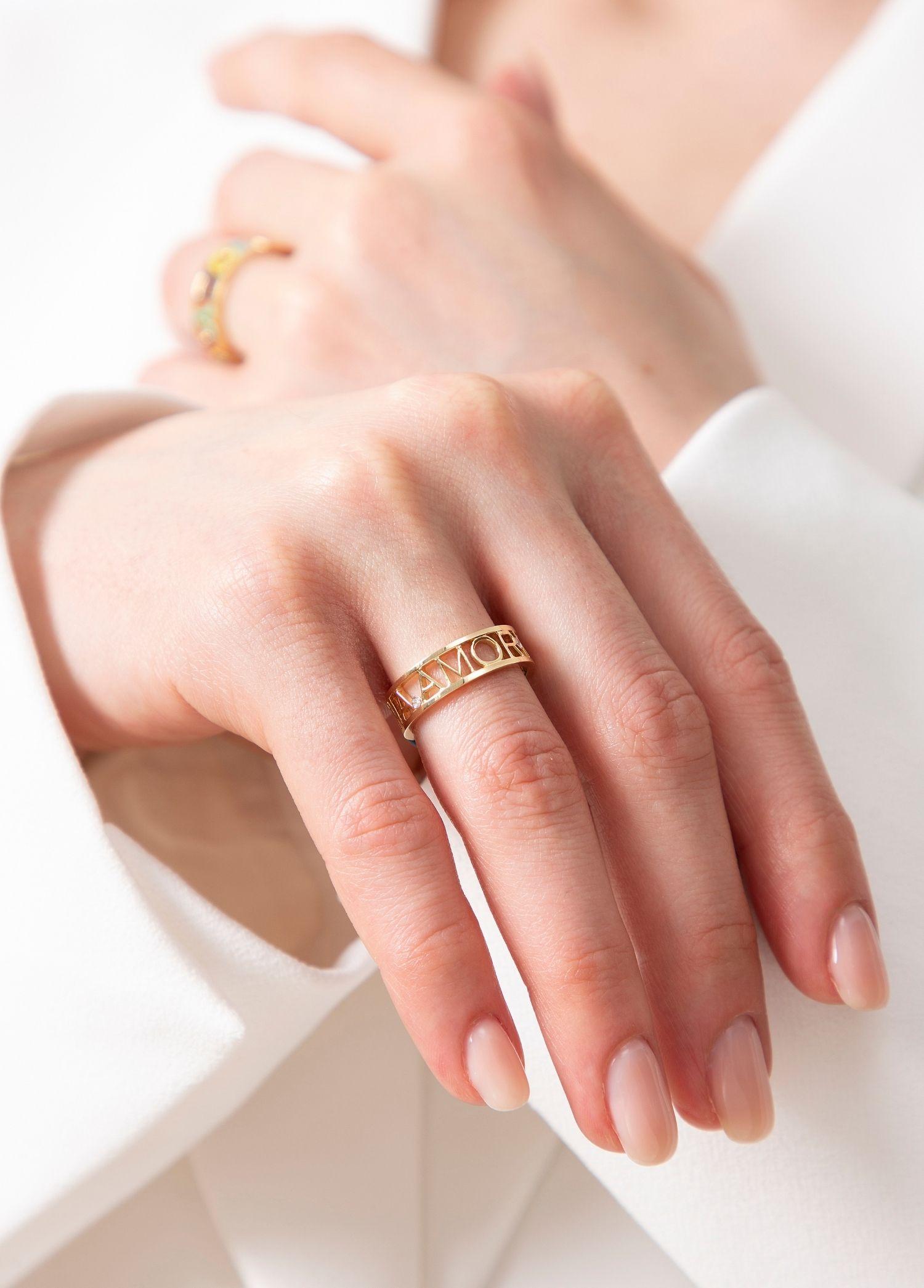 Modern Melie Jewelry Amor Vincit Omnia Ring In 14K Gold & Diamond  For Sale