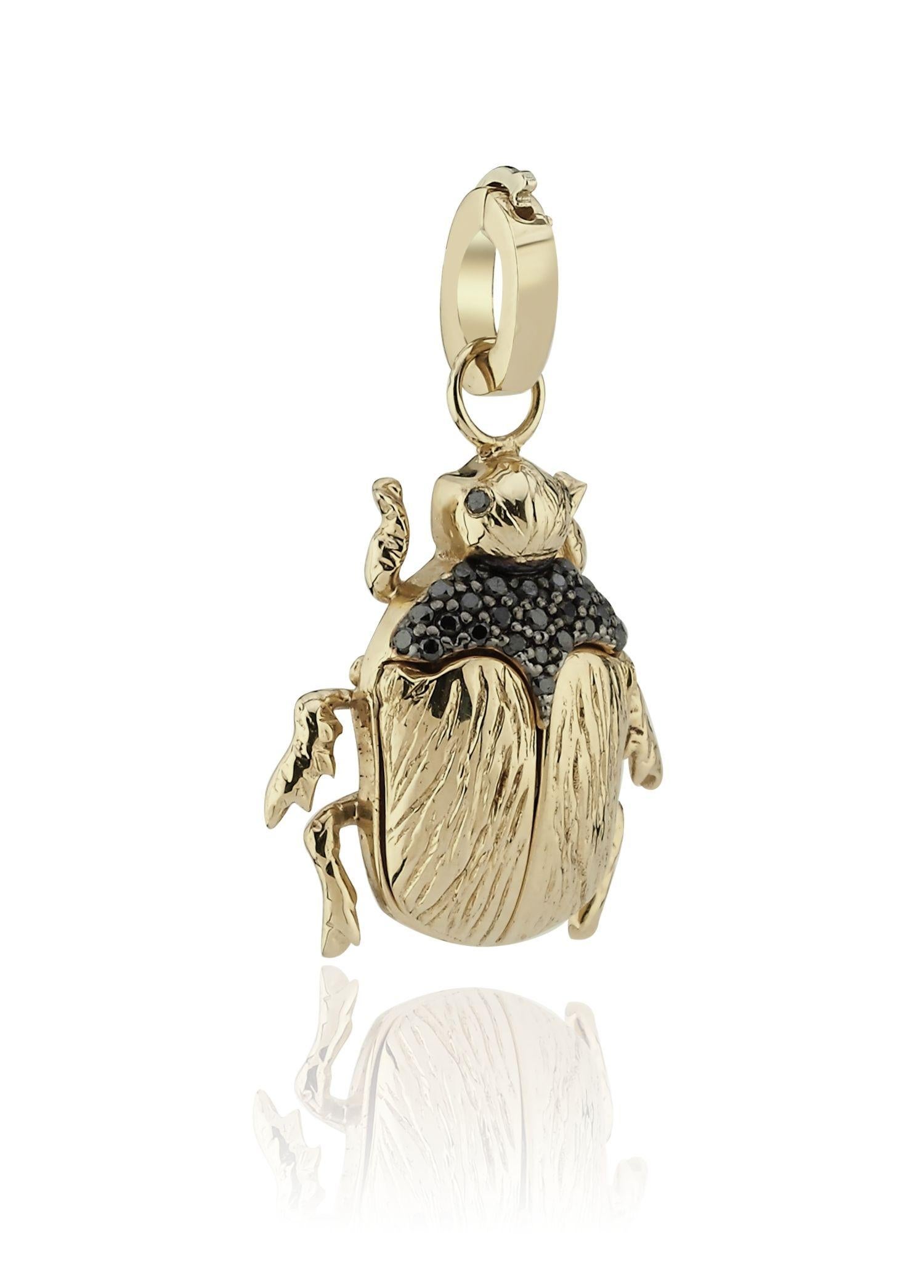 Melie Jewelry Scarab Locket Charm

14K Gold, 0.15 ct Black Diamond

The Story Behind
The Scarab Charm from our Cleopatra collection offers a unique experience to the wearer with its opening wings and the ability to place photos inside. Adorned with