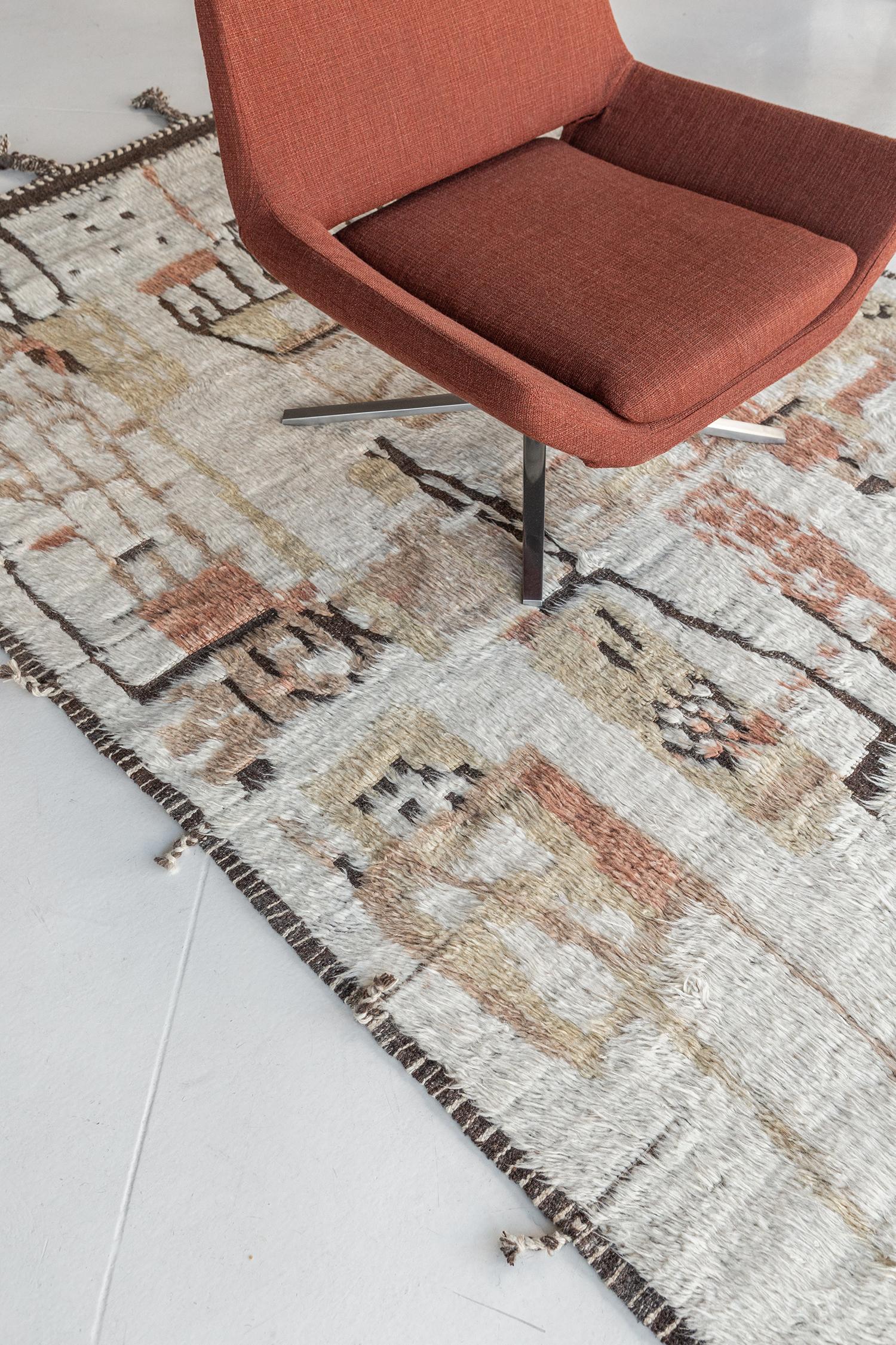 Meliska is a captivating textured rug with irregular motifs inspired by the Atlas Mountains of Morocco. Earthy tones of ivory, cream, and chocolate brown surrounded by umber brown shag work cohesively to make for a great contemporary interpretation