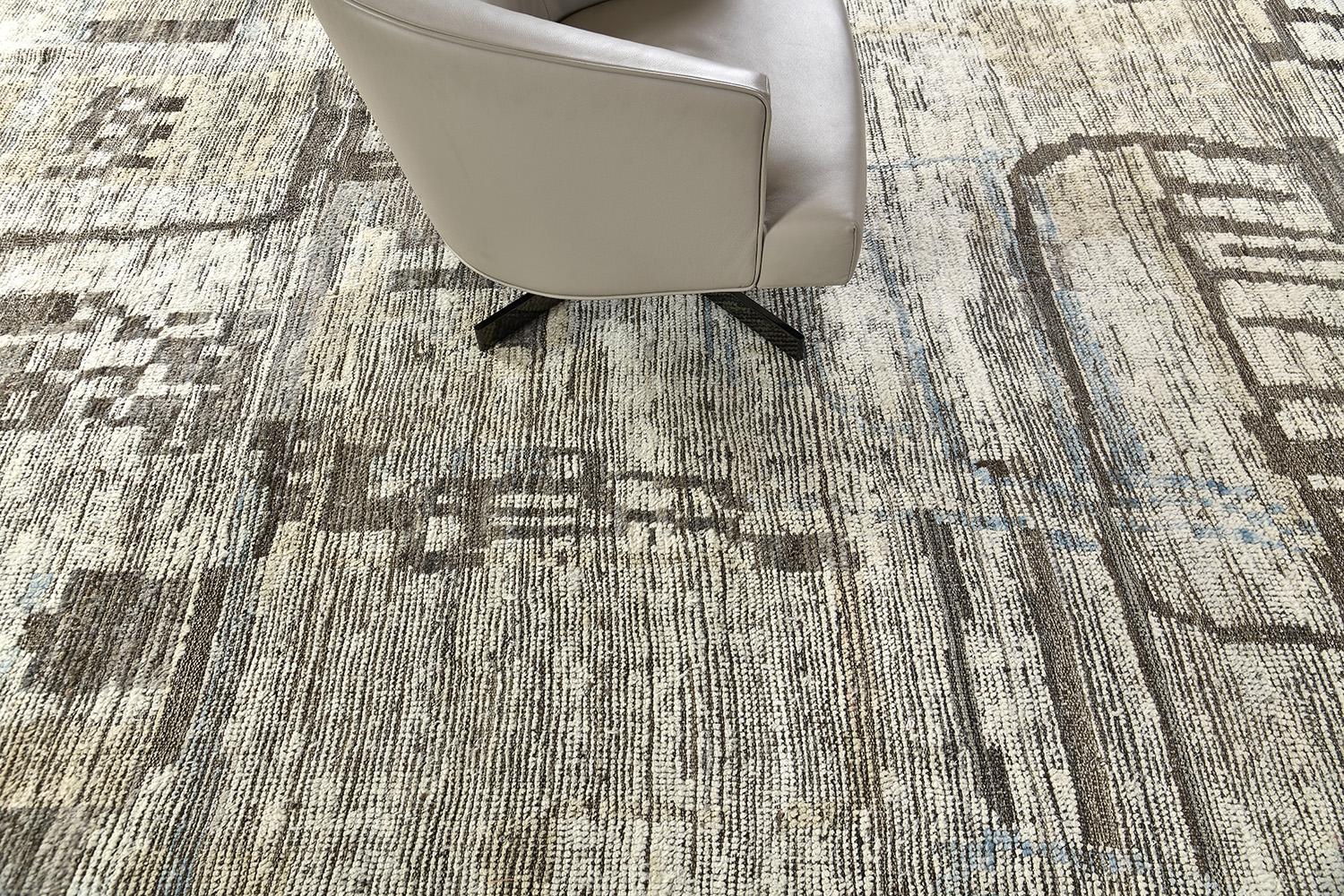 A modern transitional rug called Meliska in Atlas Collection with a gorgeous classic old-world touch. This magnificent rug features impressive ambiguous elements in the soothing earthy tones of cedar and sky blue overlaid in an abrashed ivory field