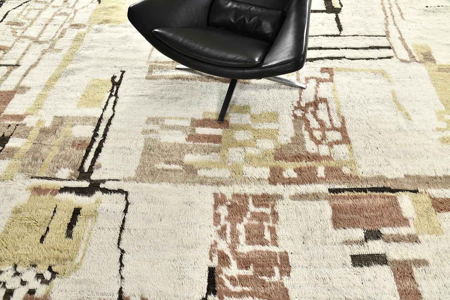 'Meliska' is an exquisitely textured rug with irregular motifs inspired from the Atlas Mountains of Morocco. Earthy tones of ivory, cedar and umber brown surrounded by umber brown shag work cohesively to make for a great contemporary interpretation
