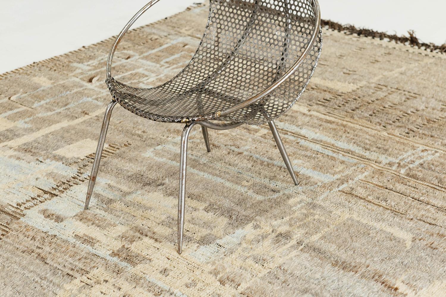 Meliska' is a beautifully textured rug with irregular motifs inspired from the Atlas Mountains of Morocco. Softened earth tones work cohesively to make for a great contemporary interpretation for the modern design world. Mehraban's Atlas collection