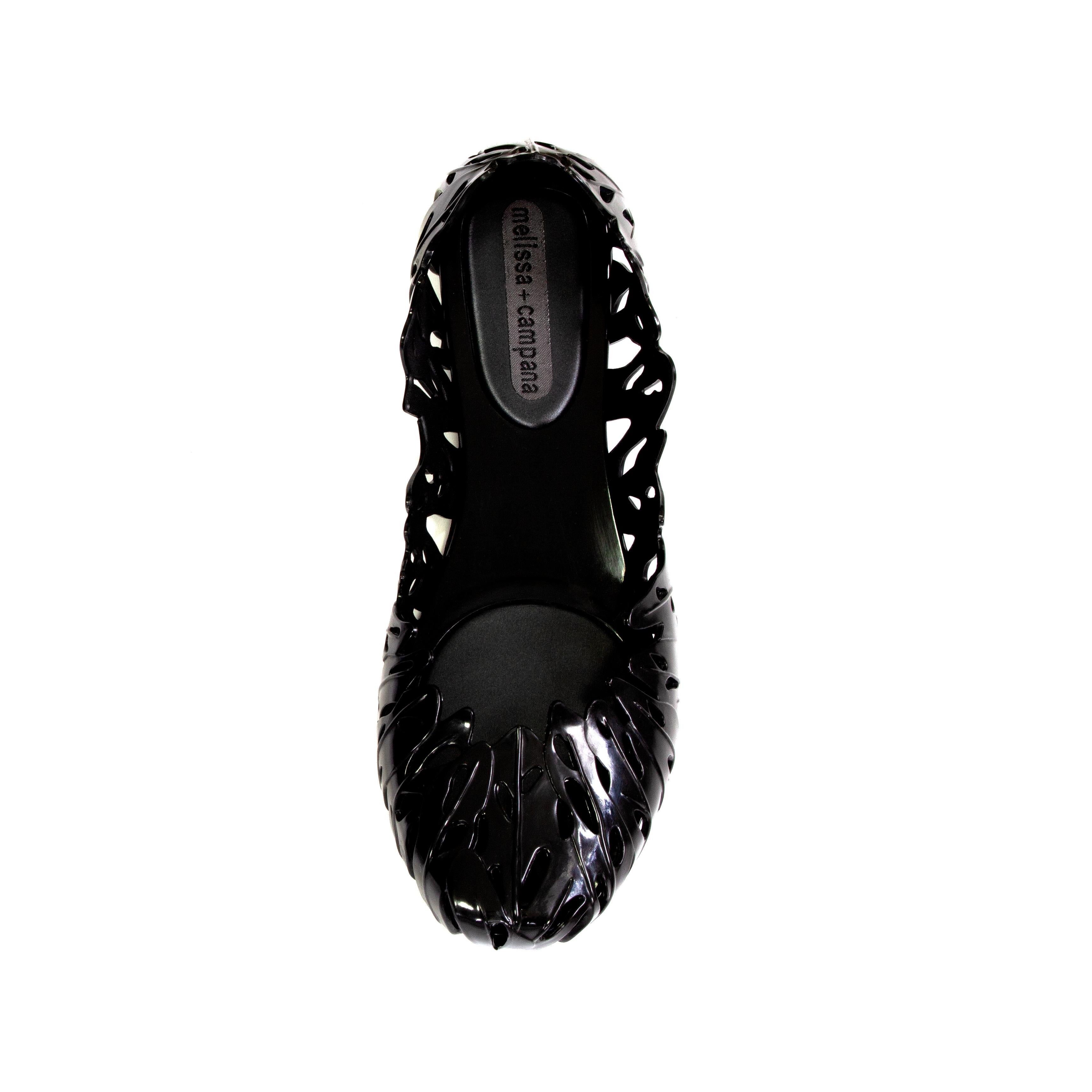 Product Details: Melissa Campana - Costela De Adao - Black Gloss - Cut-Out Rubber Pumps - Shoes - Flats 
Label: Melissa Campana 
Fabric Content: Black Gloss / Cut-Out Rubber
Size: 38 / UK 5
Max Shoe Width Across: 7.5 cm 
Shoe Length - Heel to Toe:
