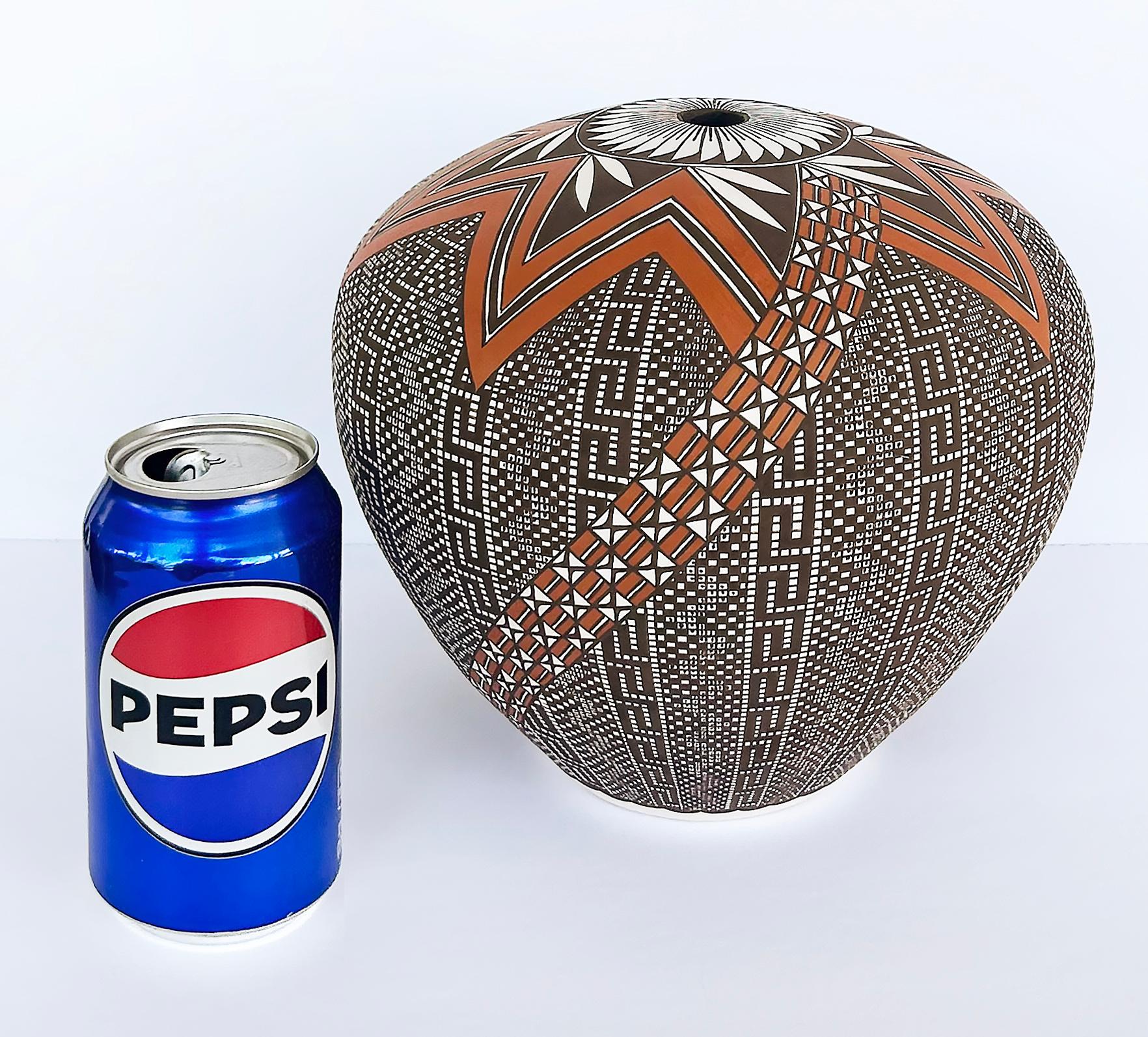 Melissa Concho Antonio Acoma N.M.Pueblo Hand-made Pot

Offered for sale is a vintage finely crafted hand-made clay Acoma Pueblo clay pot which is decorated with extremely intricate patterns by M.C. Antonio (1965). This piece was acquired from a top