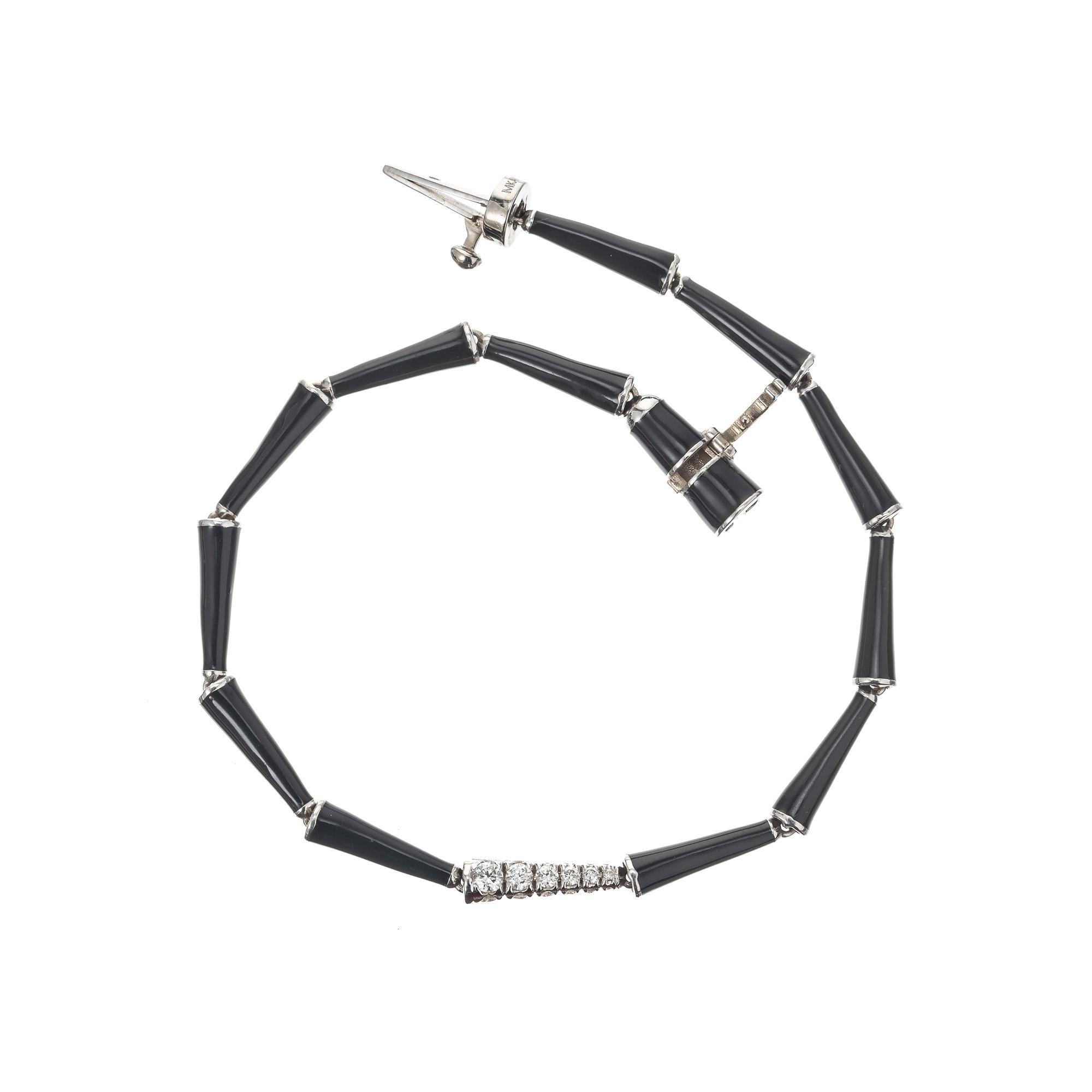 Melissa Kaye Lola diamond and enamel link bracelet. 18k white gold bracelet with 18 round diamonds and 13 black enamel cones measuring 6.75 inches. 
Follow us on our 1stdibs storefront to view our weekly new additions and 5 Star Reviews at Peter