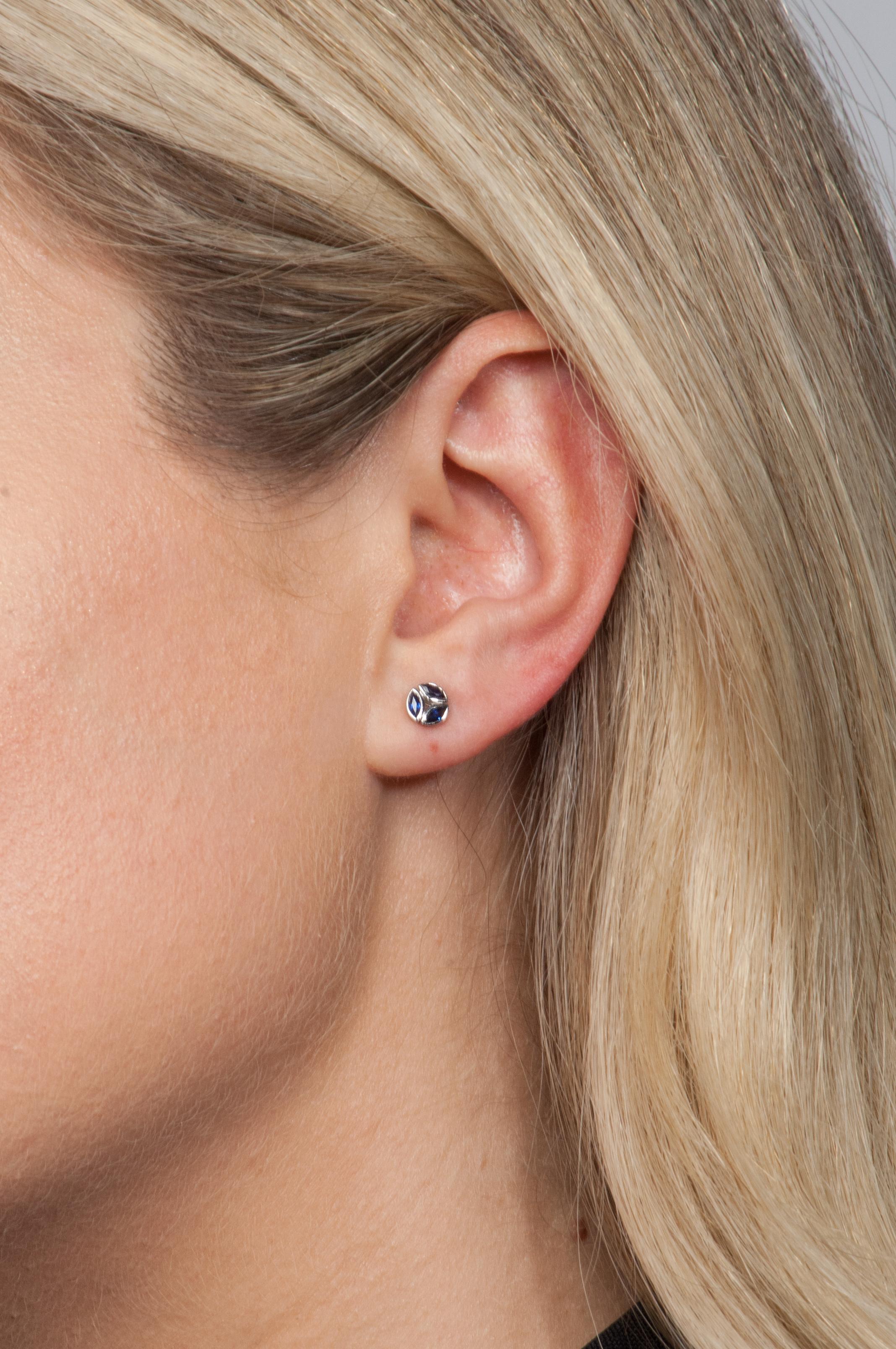 These delicate sapphire studs are an easy everyday choice. Wear alone for a classic look or stack above your favorite hoops.

18K white gold with blue sapphires (0.46 tcw)
0.24” diameter